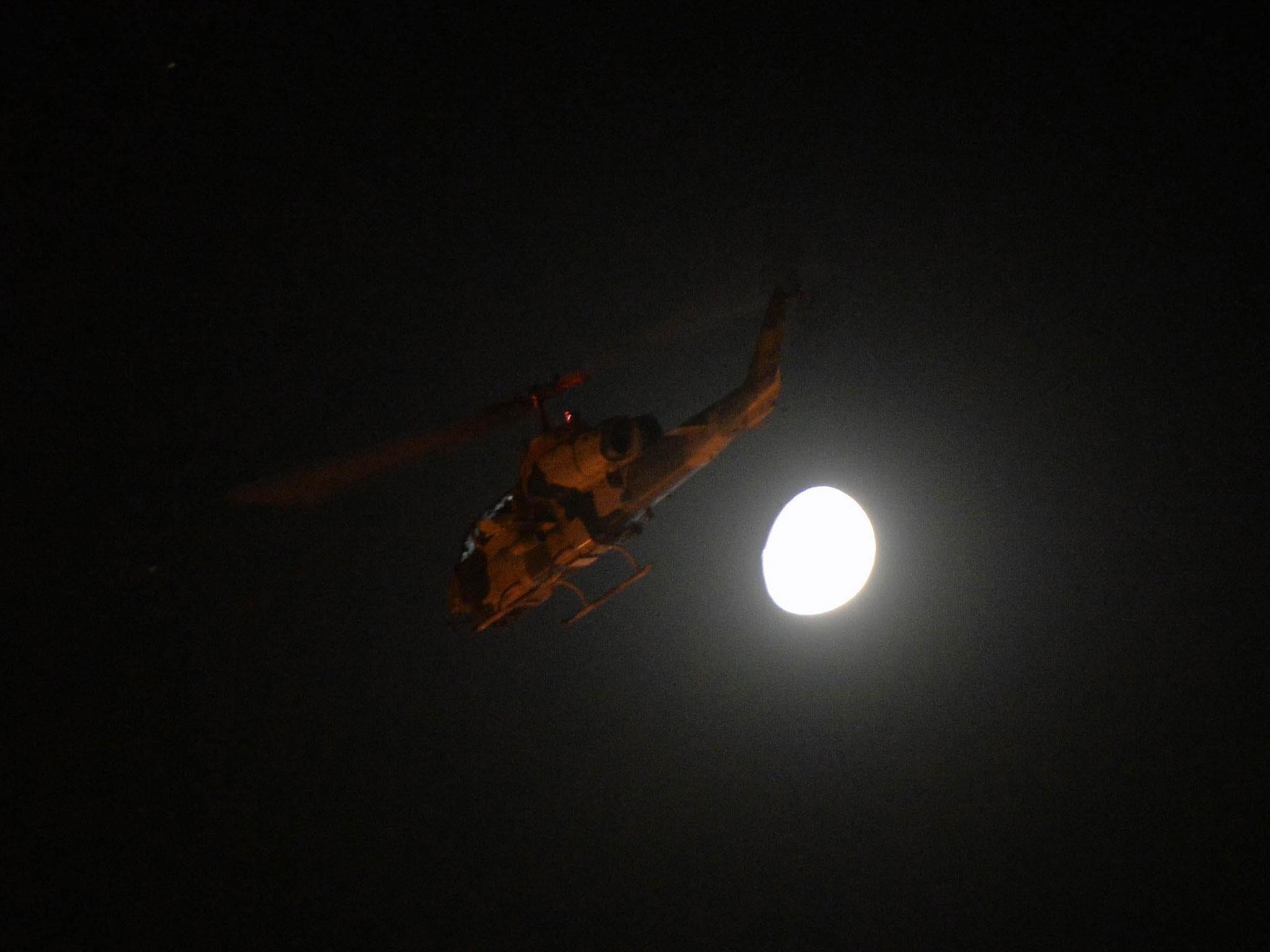 A Turkish army helicopter flies above Ankara