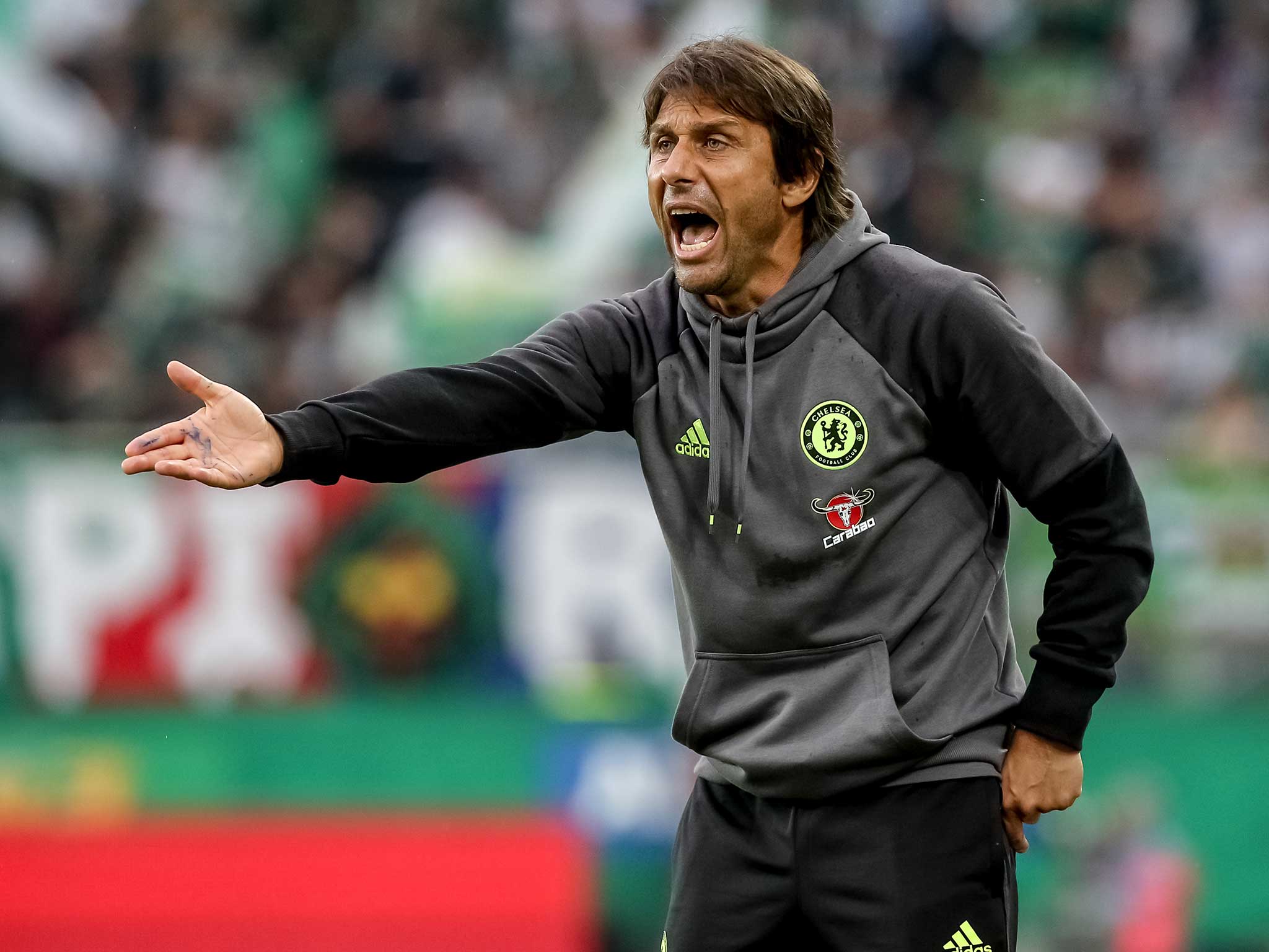 Antonio Conte watches on as Chelsea lose their first pre-season match to Rapid Vienna