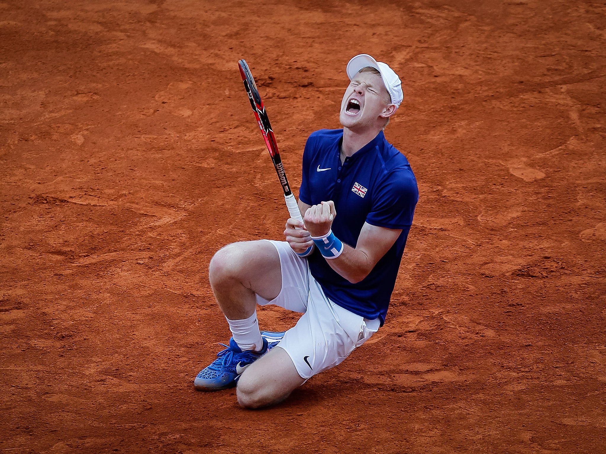 Kyle Edmund celebrates after defeating Dusan Lakovic in the Davis Cup win over Serbia