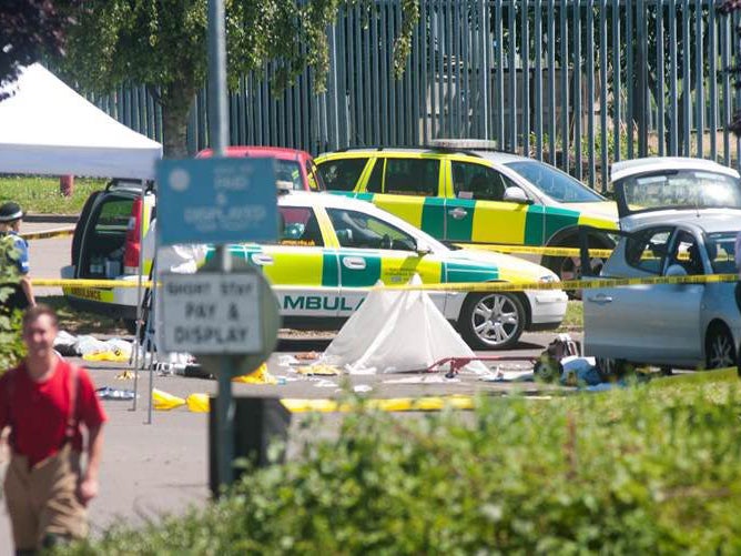 Emergency services at the scene of a triple shooting near the Castle Swimming Pool, on Pinchbeck Road in Spalding, Lincolonshire