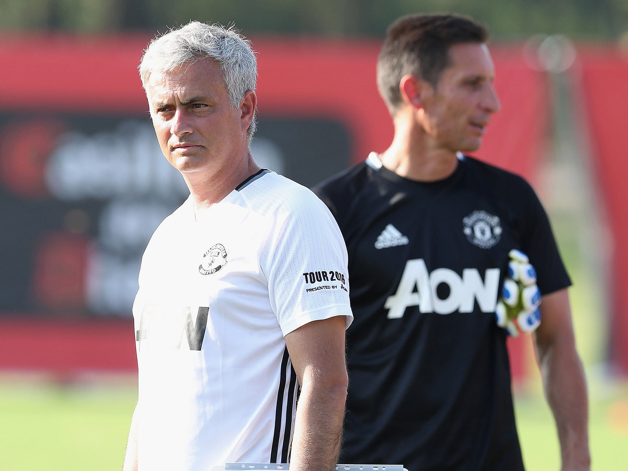 Mourinho on the training pitch at United's Shanghai base