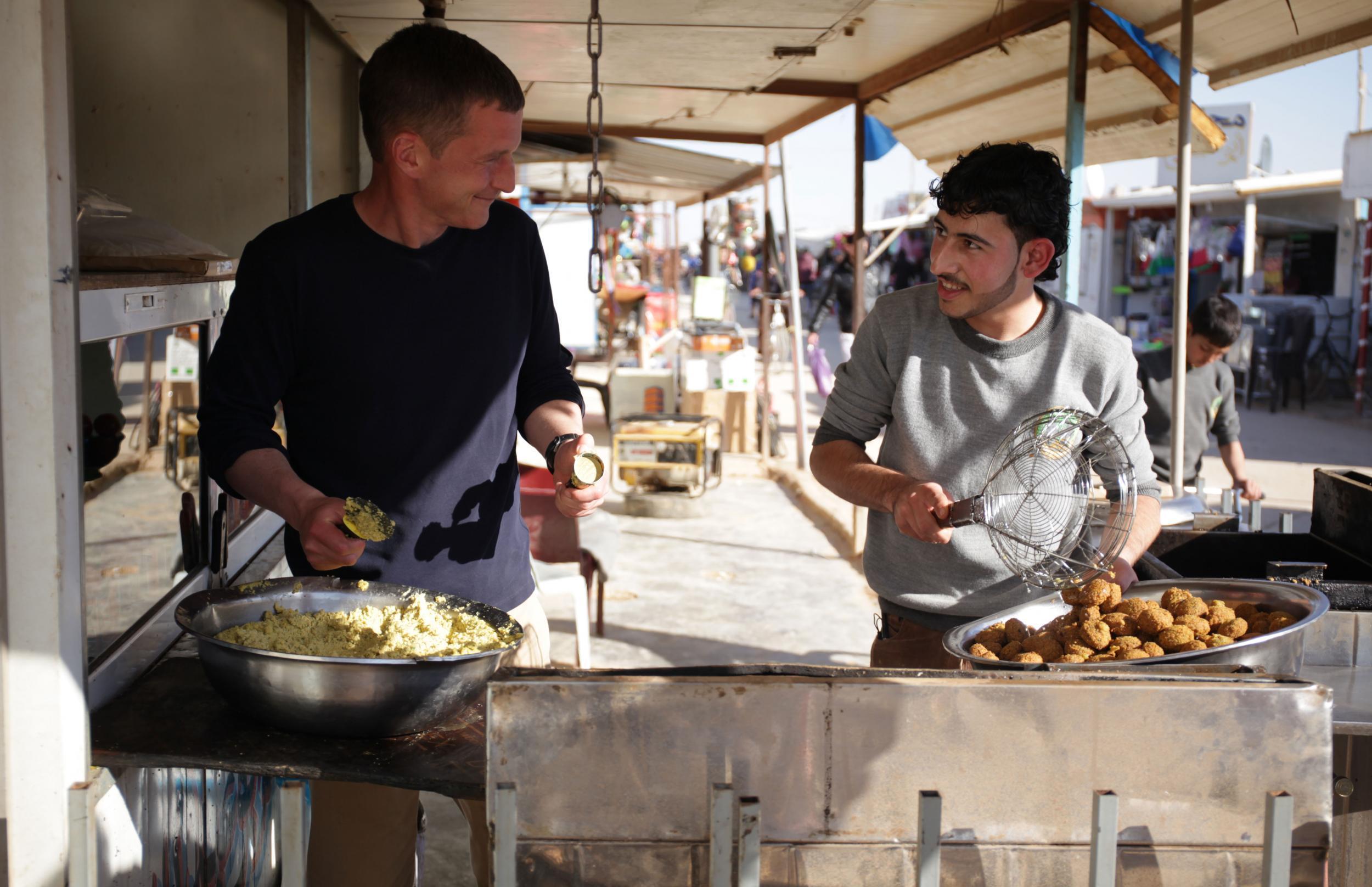 Ben Timberlake helps out on a falafel stand