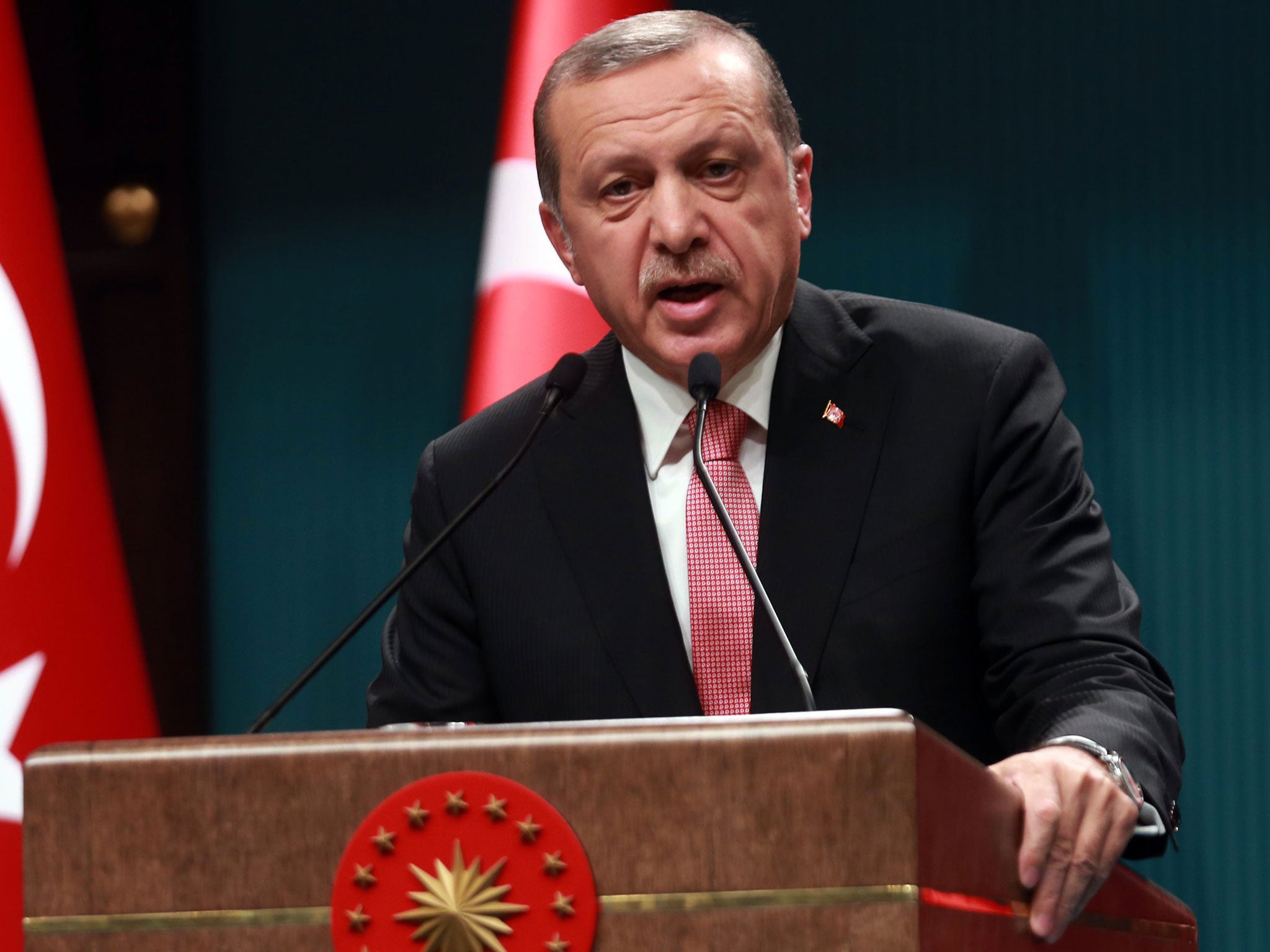 Turkish President Recep Tayyip Erdogan says he will 'reorganise' the military in response to the coup (AFP/Getty Images)