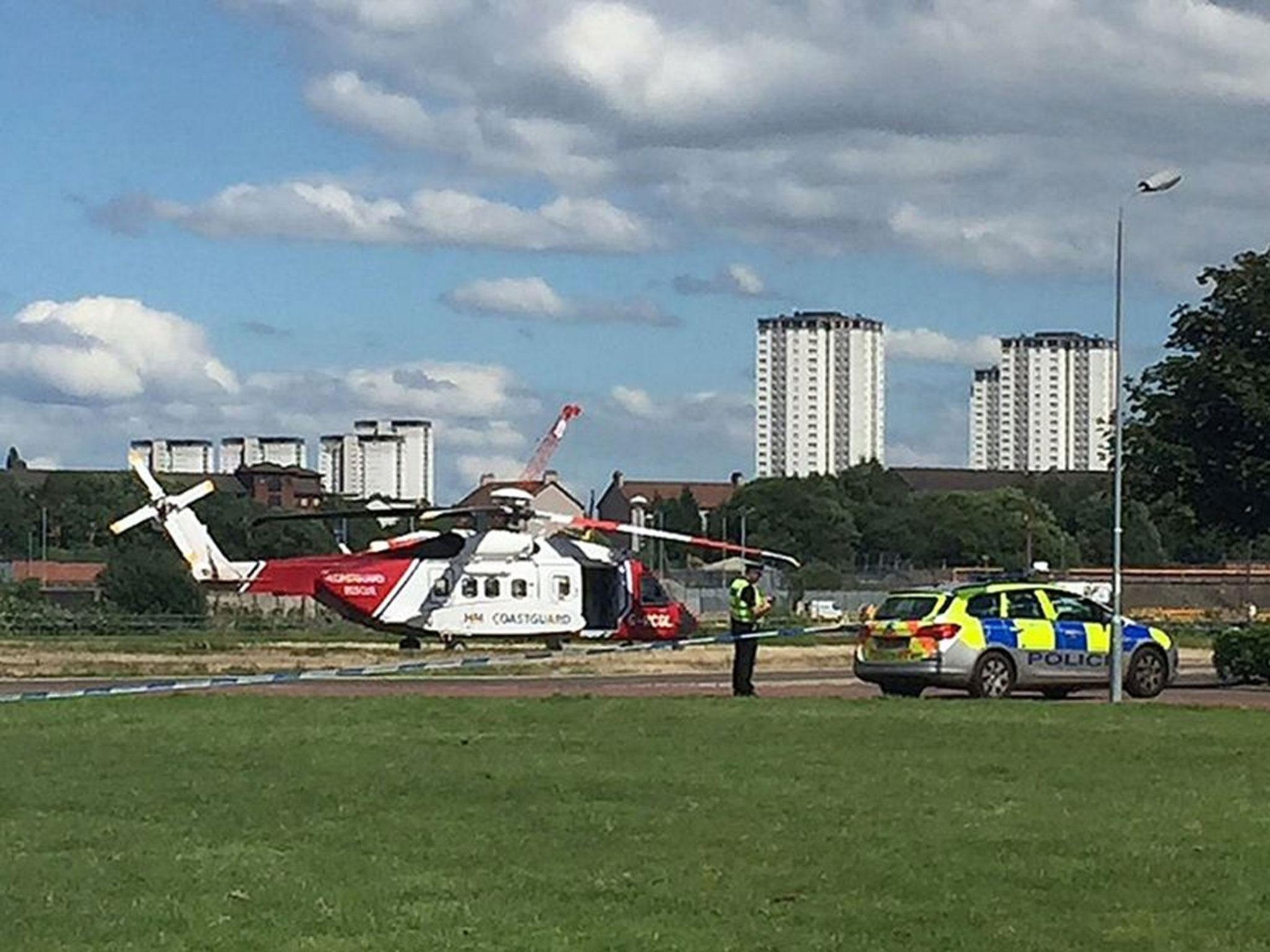 Handout photo taken with permission from the Twitter feed of @honestman28 of the scene close to Braehead shopping centre, Renfrew, where a car has gone into the River Clyde