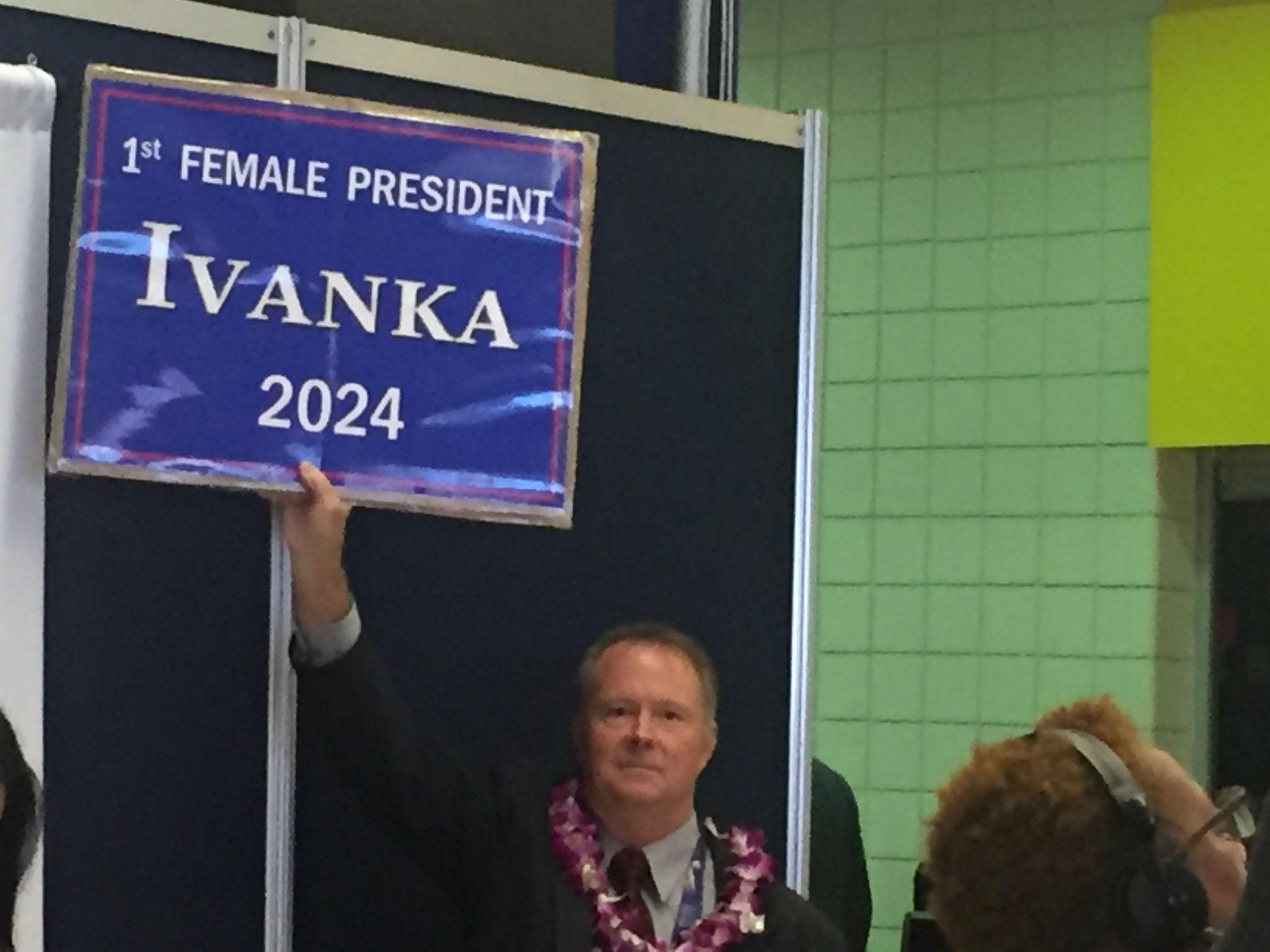 &#13;
A delegate at the GOP Convention in Cleveland holds a homemade sign heralding Ivanka Trump's future political prospects&#13;