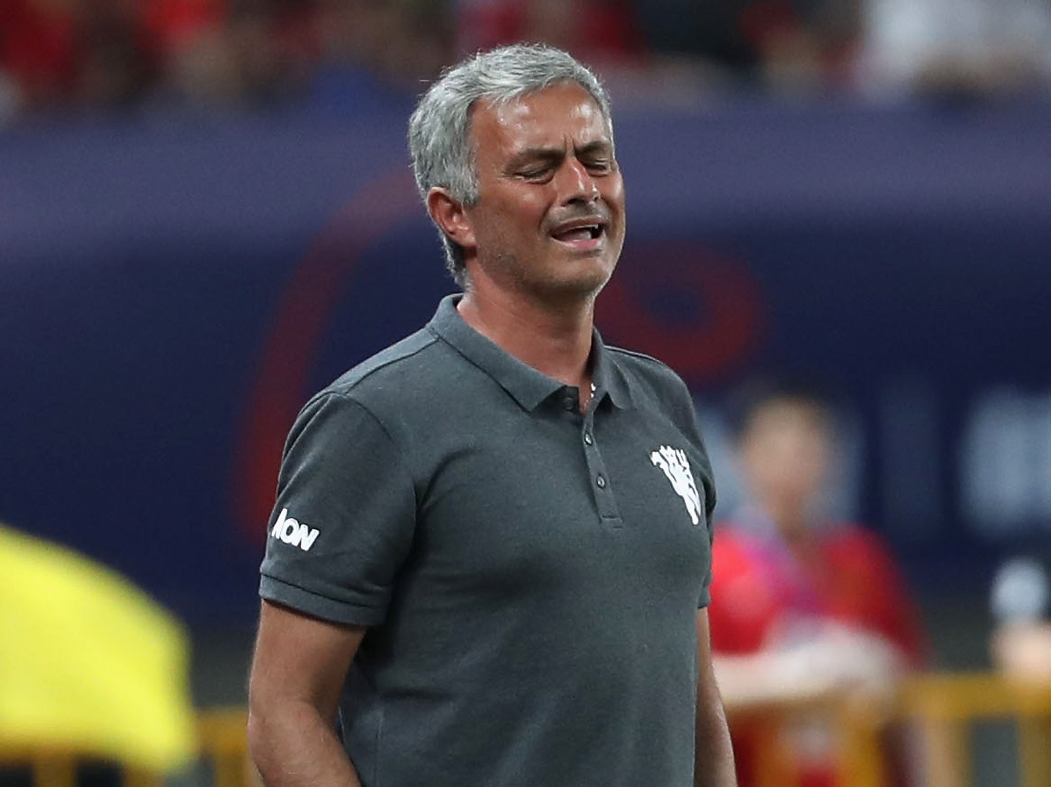 Mourinho watches on from the sidelines in Shanghai