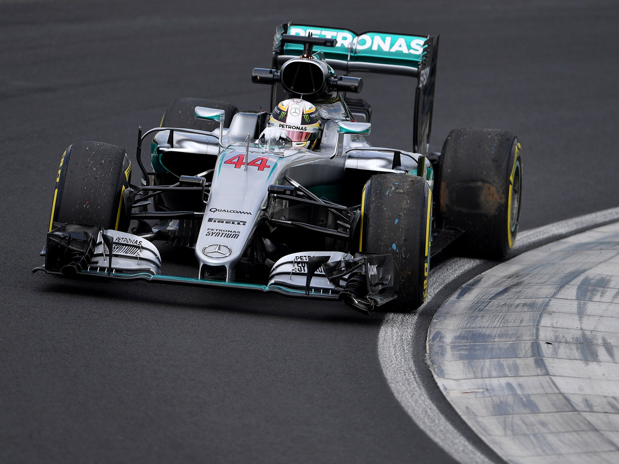 Lewis Hamilton limps back to the pits after his crash in practice