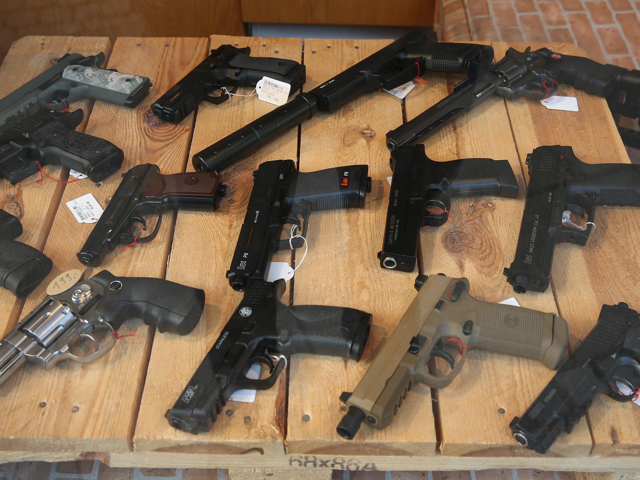 Air guns on display in a hunting and weapons store in Bremen