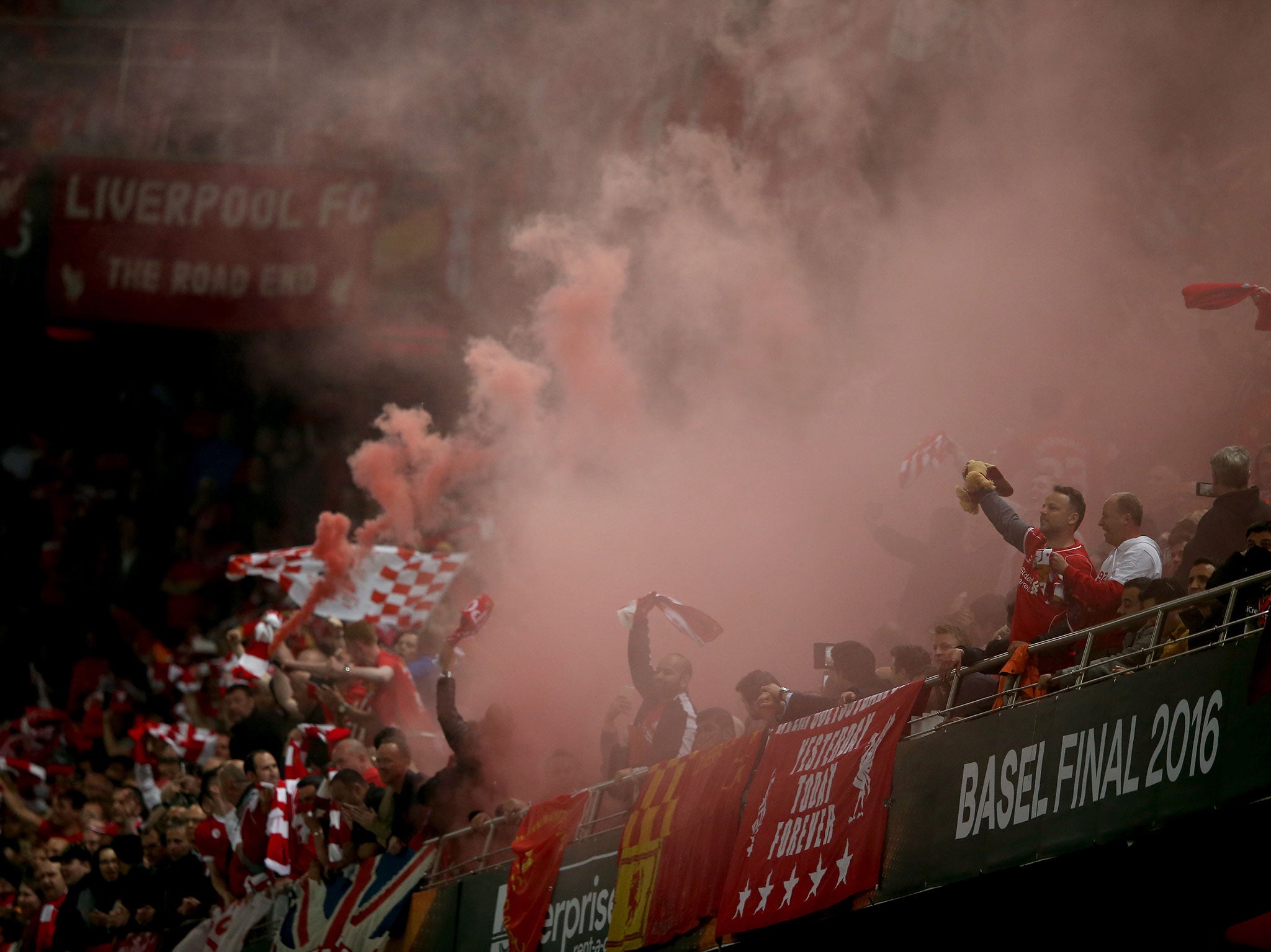 &#13;
Disruptive Liverpool fans set off flares &#13;