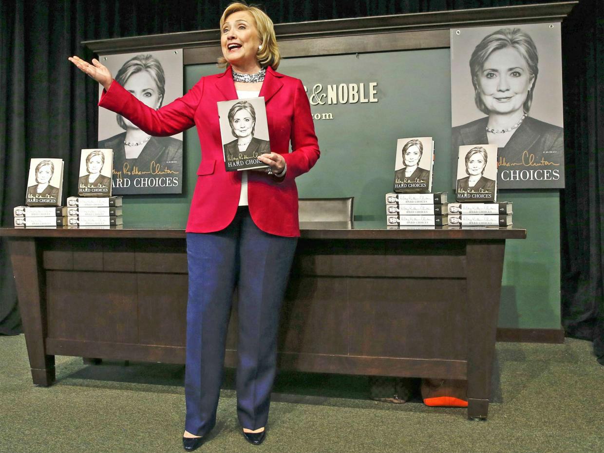 Hillary Clinton signing copies of her memoir in New York in 2014