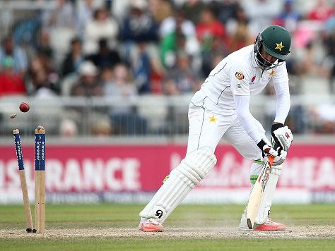 Misbah-ul-Haq is bowled by Chris Woakes as England turned the screw on the fourth day (Getty)