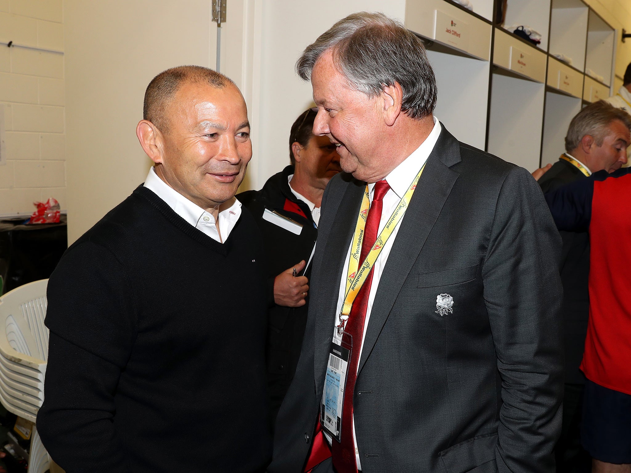 Ritchie, right, converses with England coach Eddie Jones