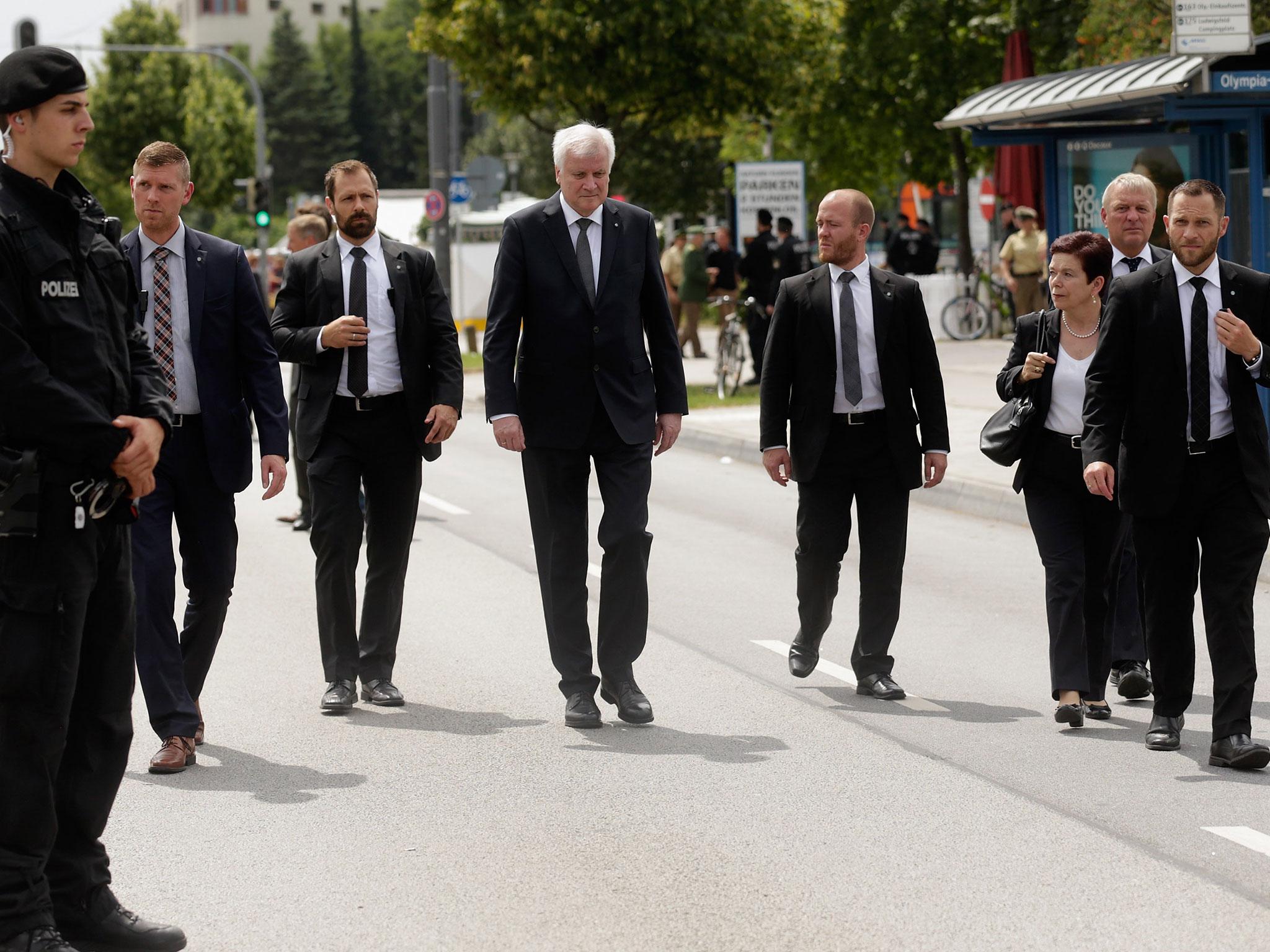 Horst Seehofer (centre) is a long-standing critic of Angela Merkel’s open-door refugee policy