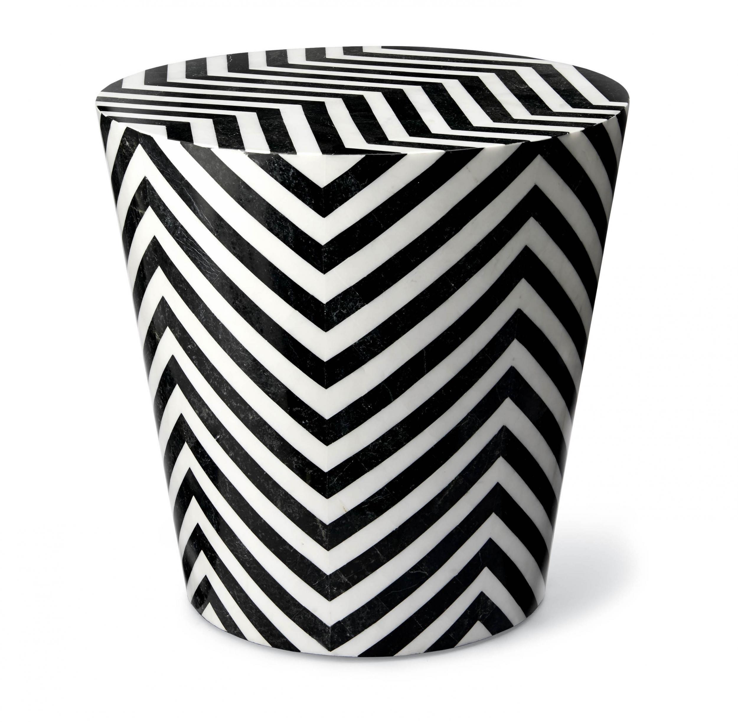 The Cadiz stool from Frontgate showcases a graphic, black and white chevron pattern reminiscent of the famous Portuguese pavement patterns found throughout Rio. Made from fossilized stone covering a resin base, it can be used outside or in as a side table or stool