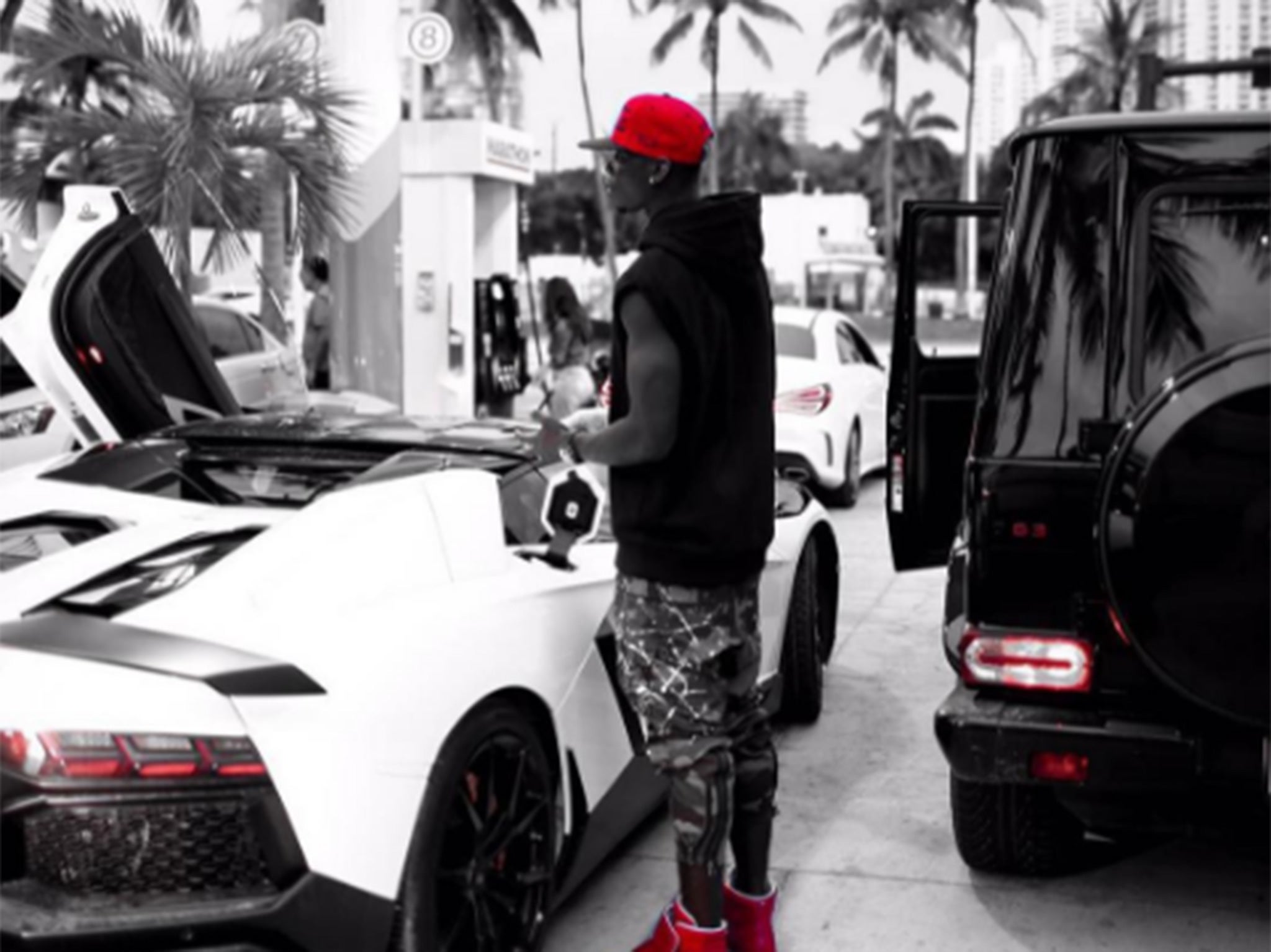 Pogba's Instagram post, showing him filling up a sports car