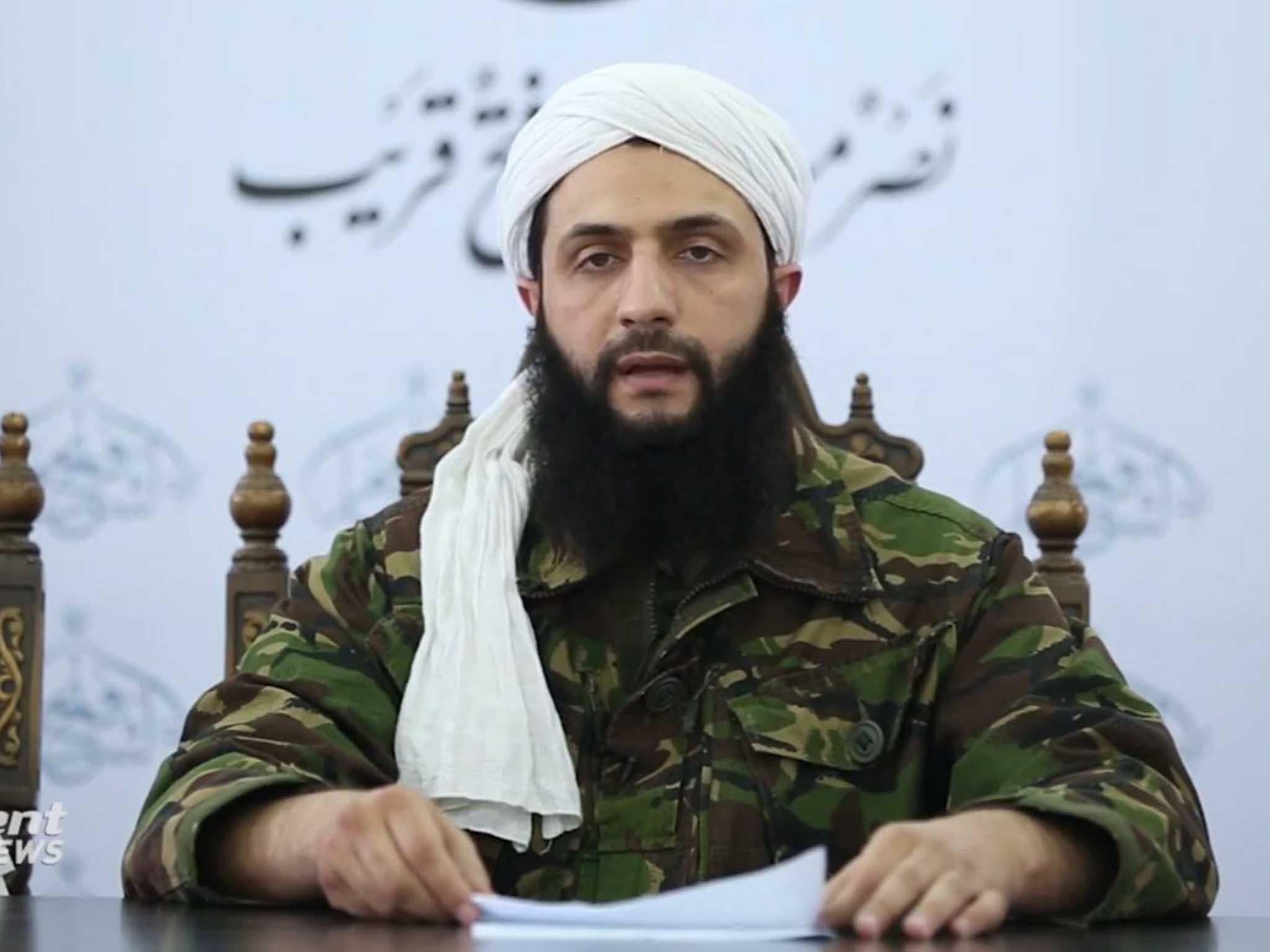 &#13;
Abu Mohammad al-Jolani reading the announcement of the creation of Jabhat Fateh al-Sham (Front for the Conquest of the Levant) &#13;