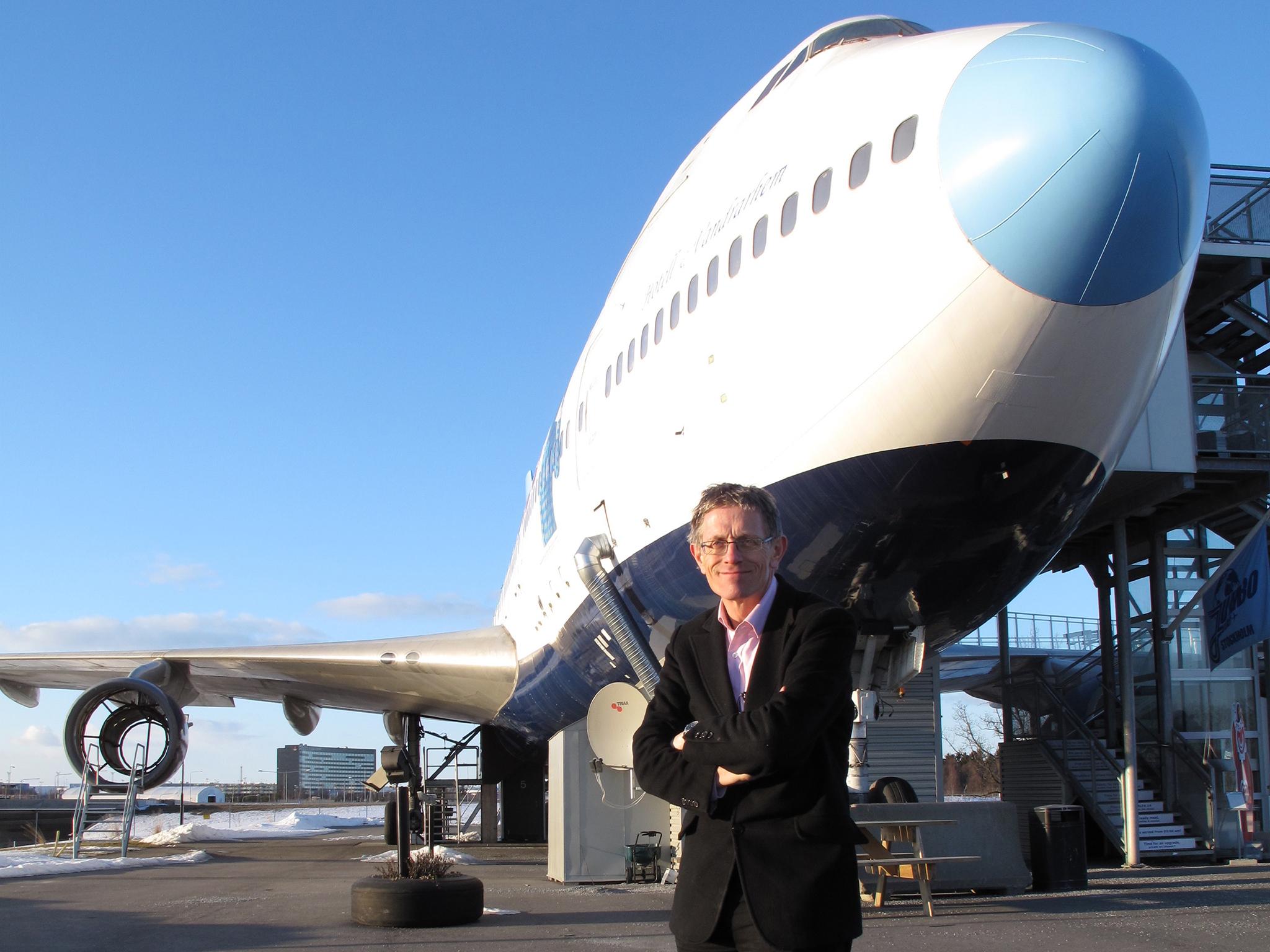 Simon Calder poses in front of the jumbo-sized hotel at Arlanda airport in Stockholm