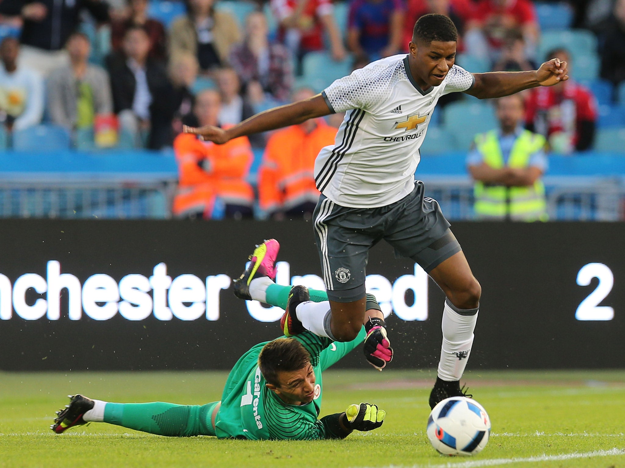 Marcus Rashford is brought down by Fernando Muslera to win a penalty for United