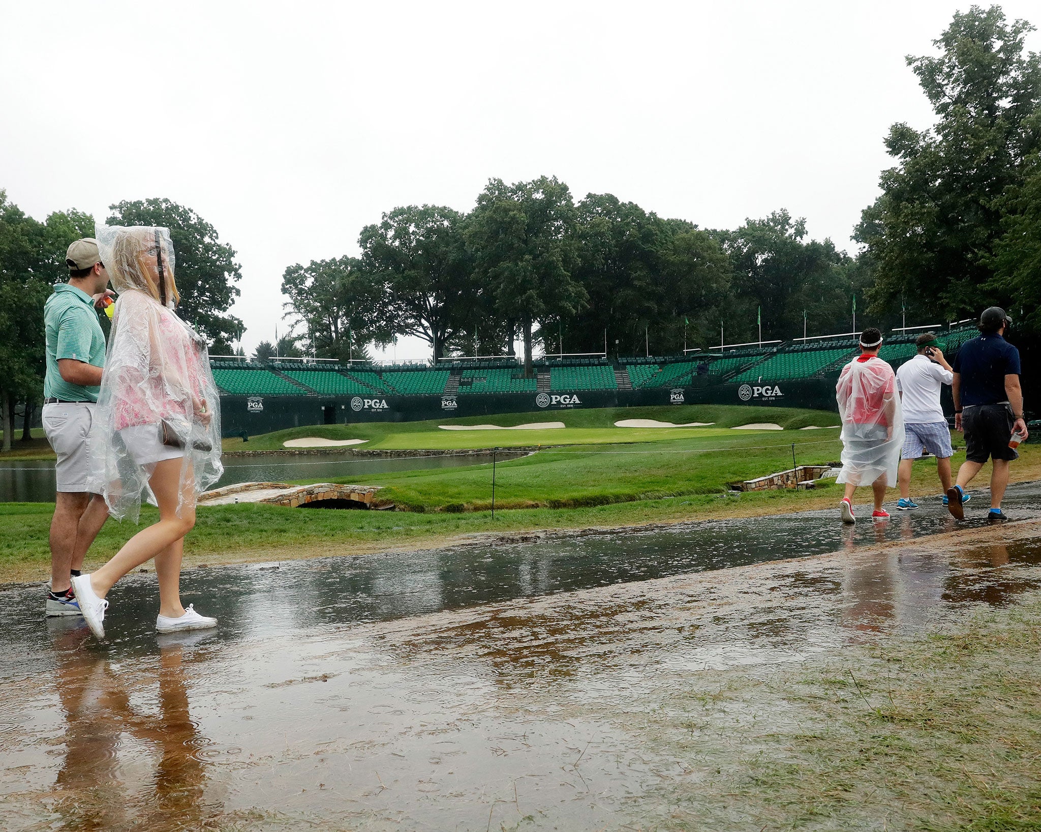 Jimmy Walker and Robert Streb were 40 minutes from teeing off in the third round when clouds gathered