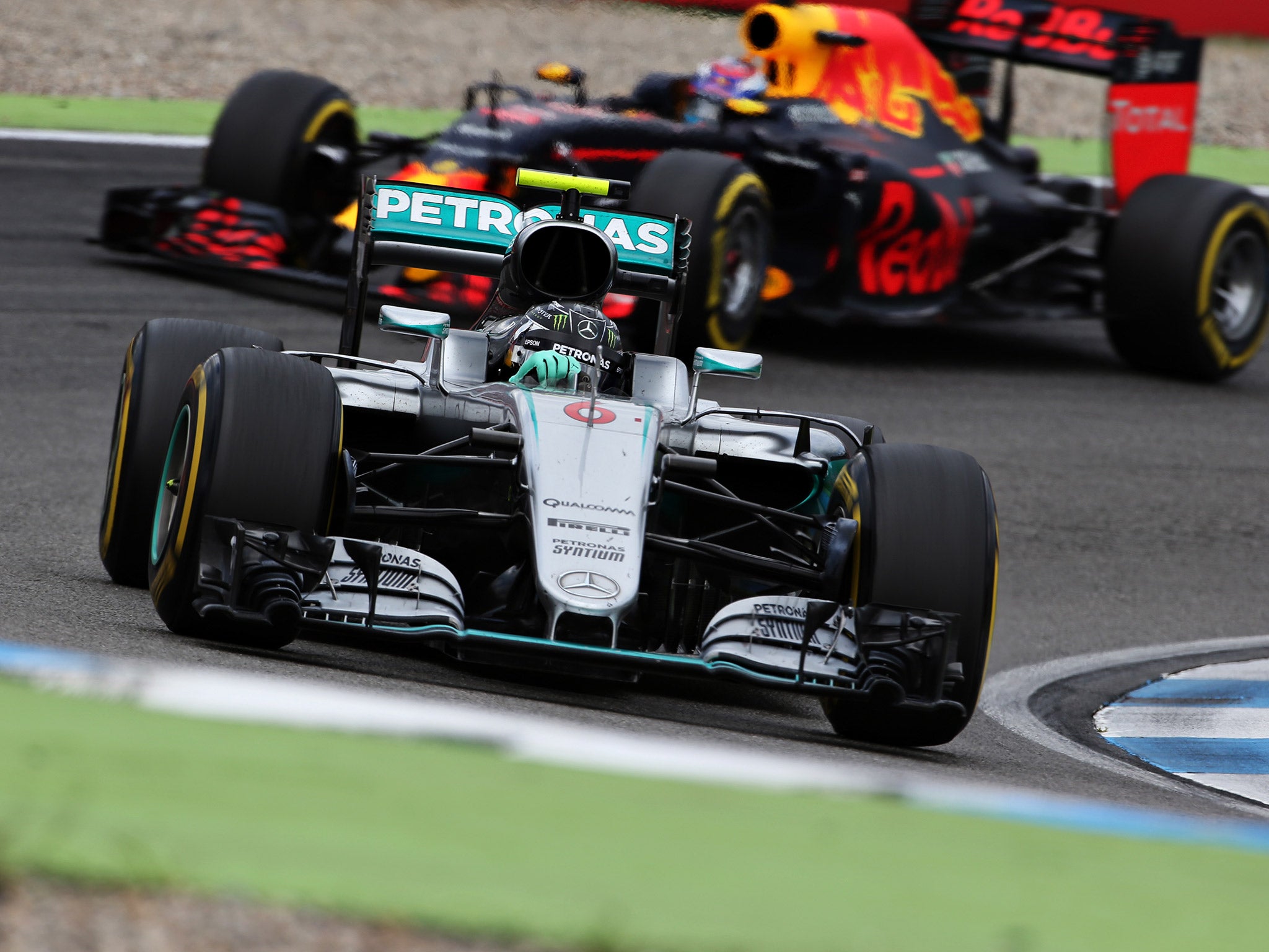 Nico Rosberg was hit with a five-second time penalty for forcing Max Verstappen off