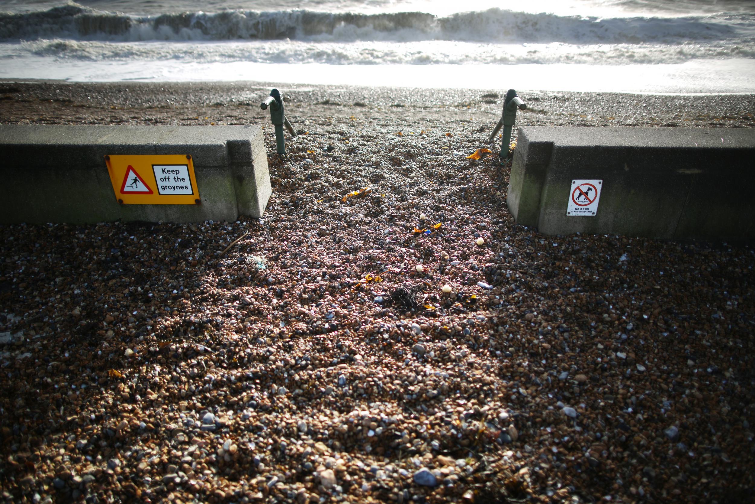 A tourist alerted emergency services and lifeguards pulled the body from the water