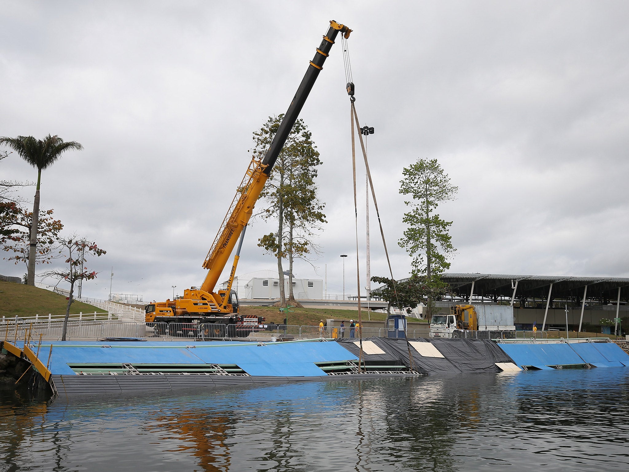 The main ramp of the sailing venue collapsed on Sunday due to high tides and severe weather