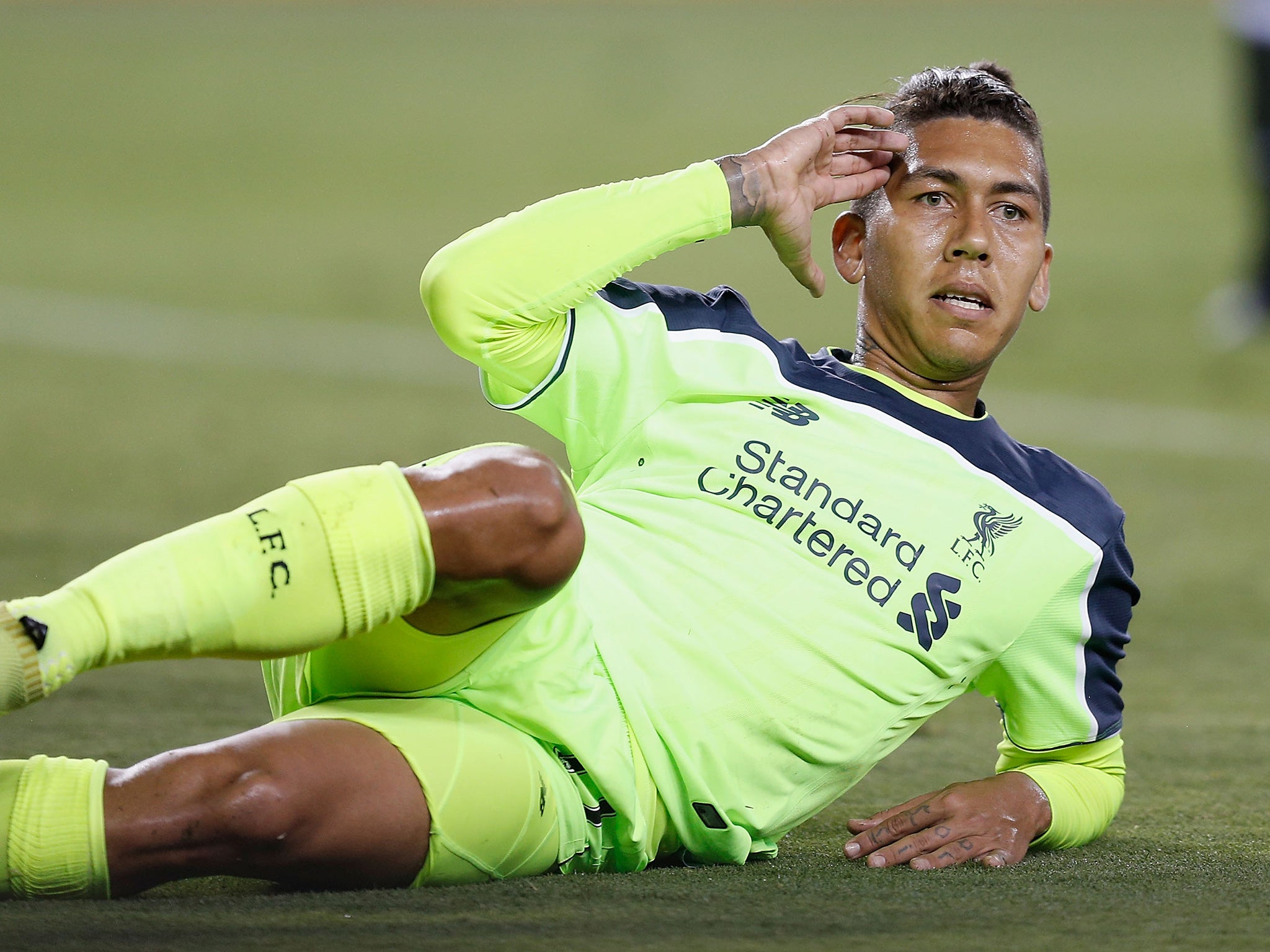 Firmino celebrates his strike against Milan