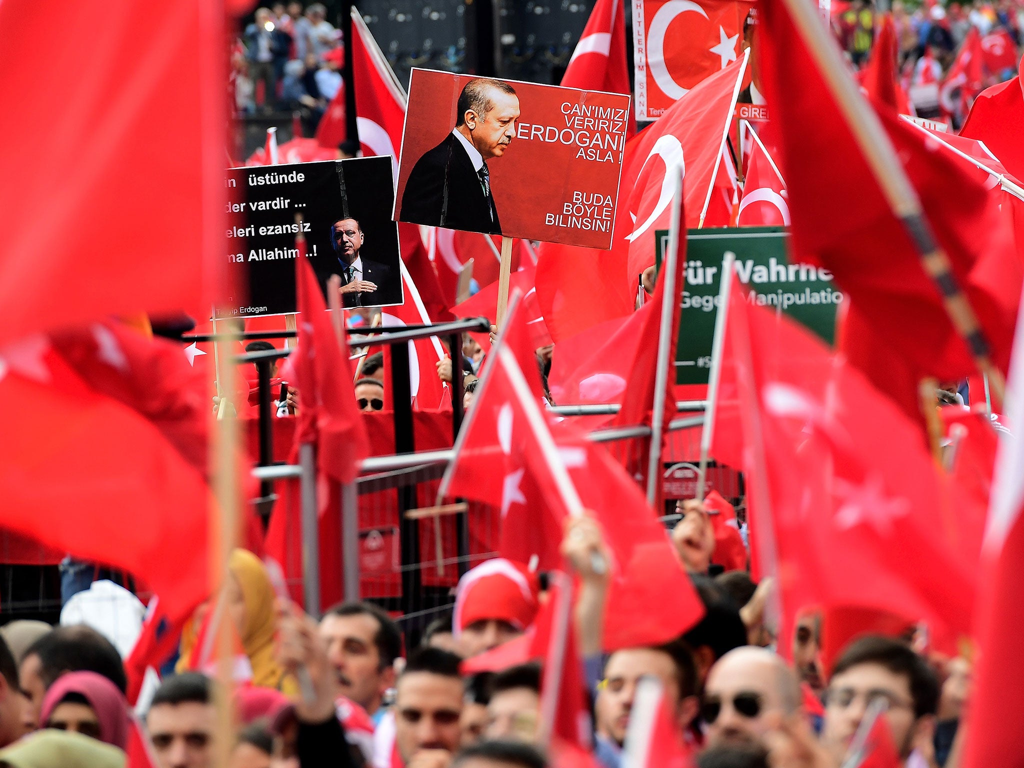 Supporters of Turkish President Recep Tayyip Erdogan at a gathering in Cologne over the weekend