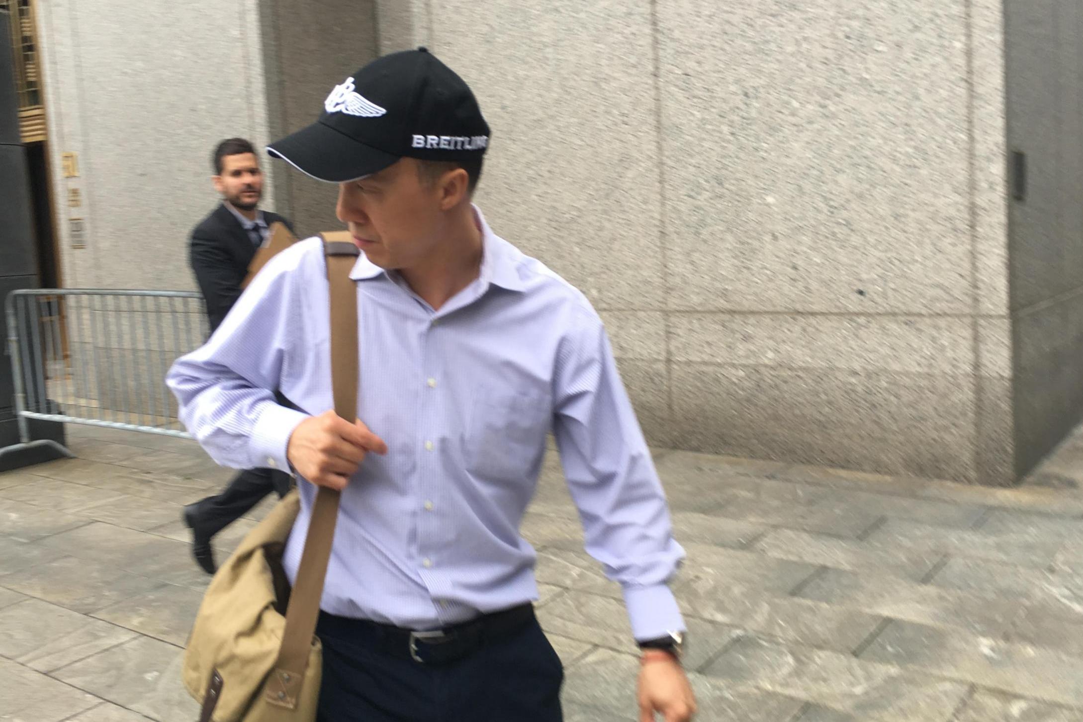 &#13;
Kun Shan Chun, an FBI employee who pleaded guilty to acting as an agent of the Chinese government, is pictured outside court in New York City. Nate Raymond &#13;