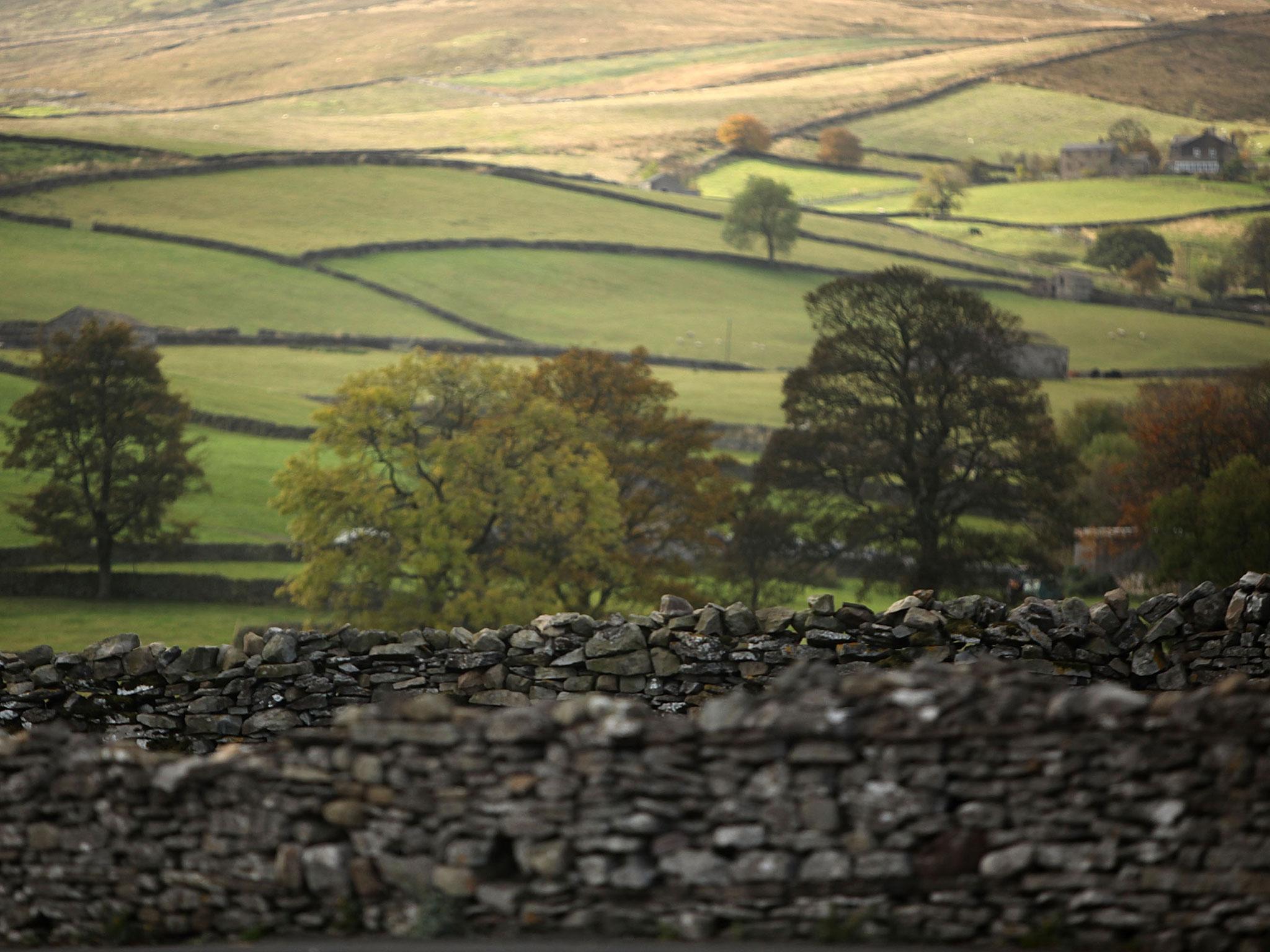 A view across Wensleydale, the home of Wensleydale Cheese in Hawes nestling in the Yorkshire Dales