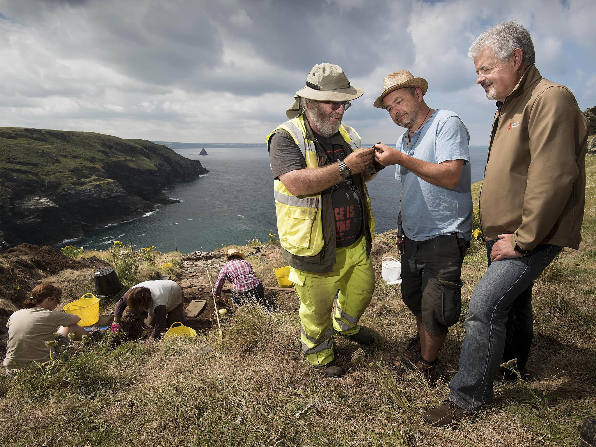 Ryan Smith (L), James Gossip of Cornwall Archaeological Unit and Win Scutt (R), curator for English Heritage on the site in Tintagel