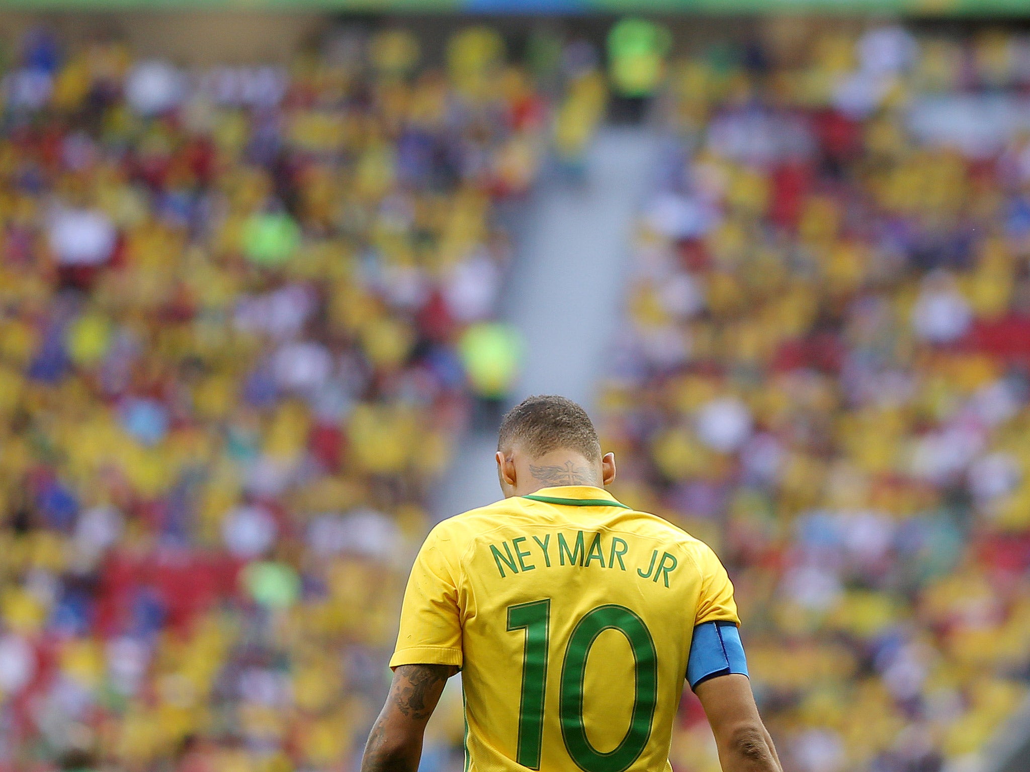 A dejected Neymar leaves the Mane Garrincha Stadium after Brazil's 0-0 draw with South Africa