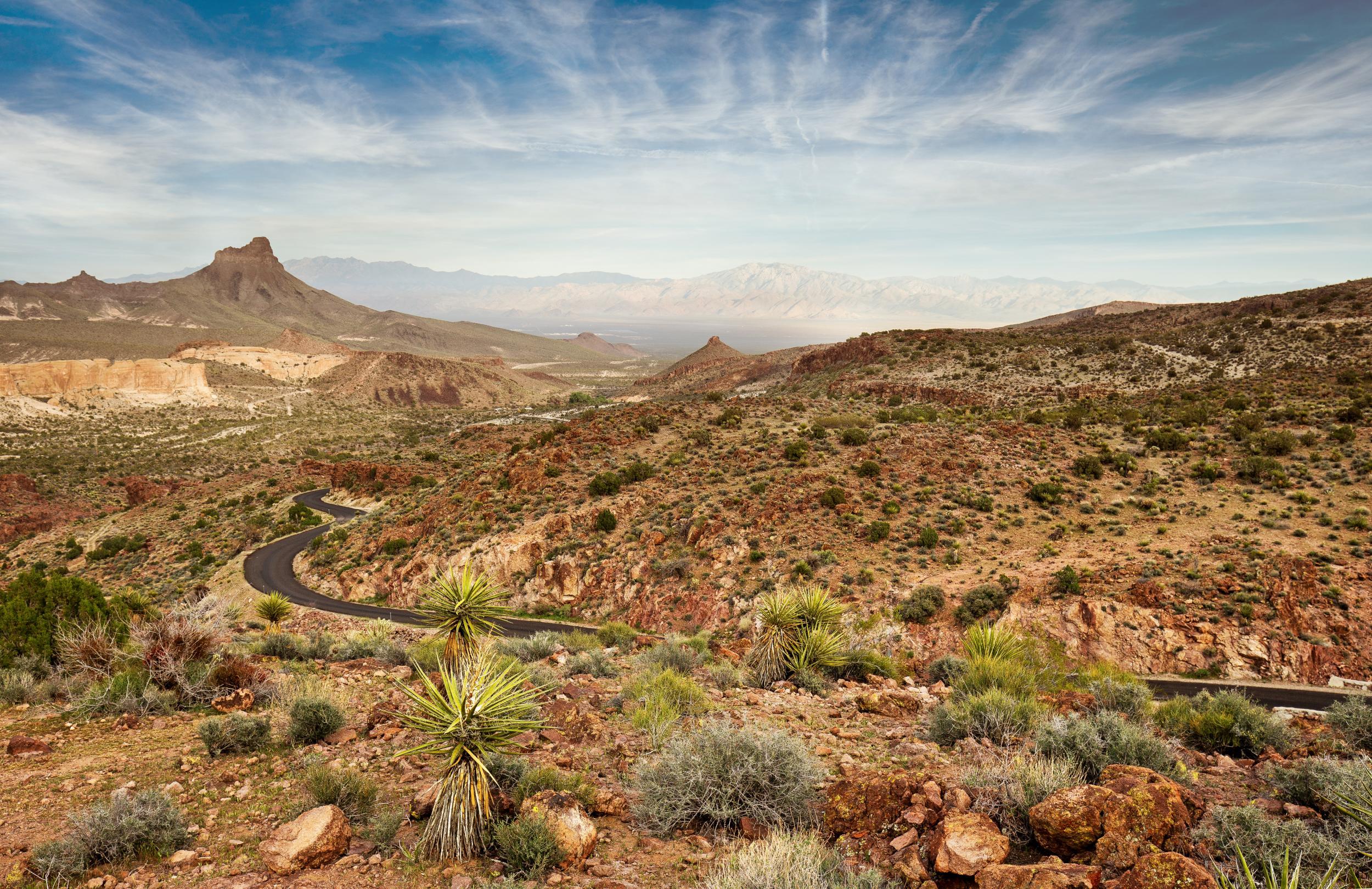 One of the greatest joys of a road trip is the scenery, like the rust-red ruggedness of Mojave National Preserve on Route 66