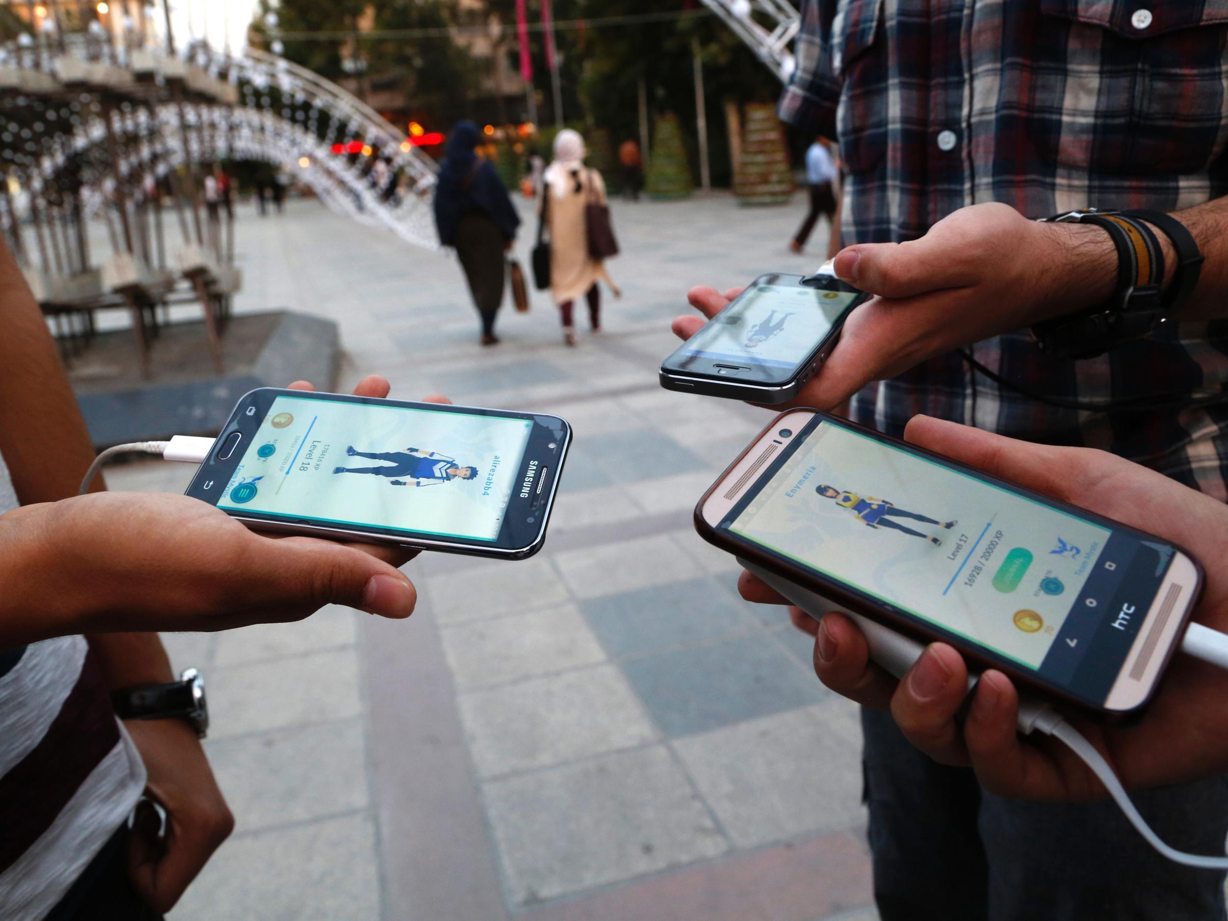 Pokemon Go players in northern Tehran's Mellat Park on 3 August