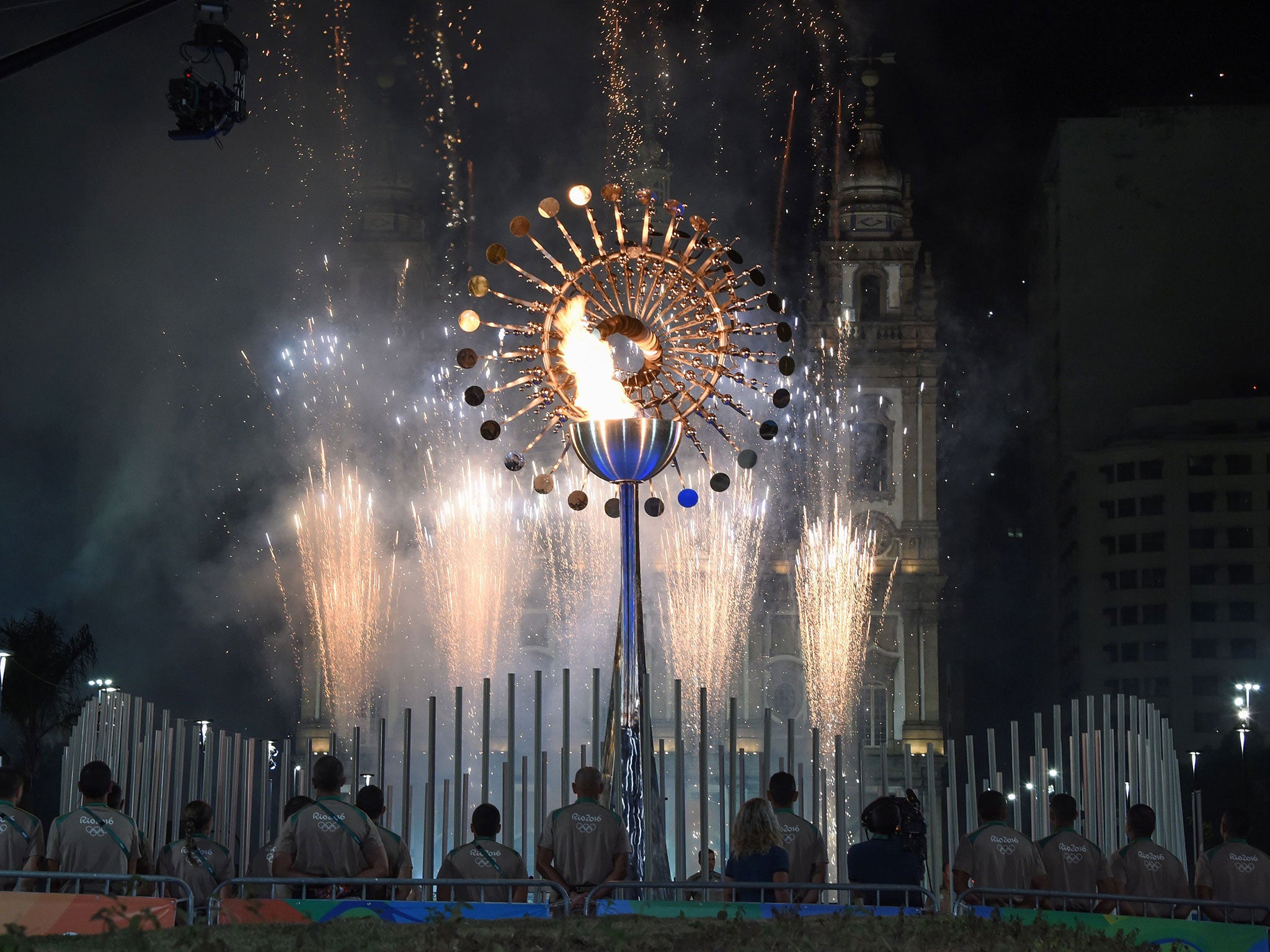 The smaller than usual cauldron is a reminder to reduce global warming