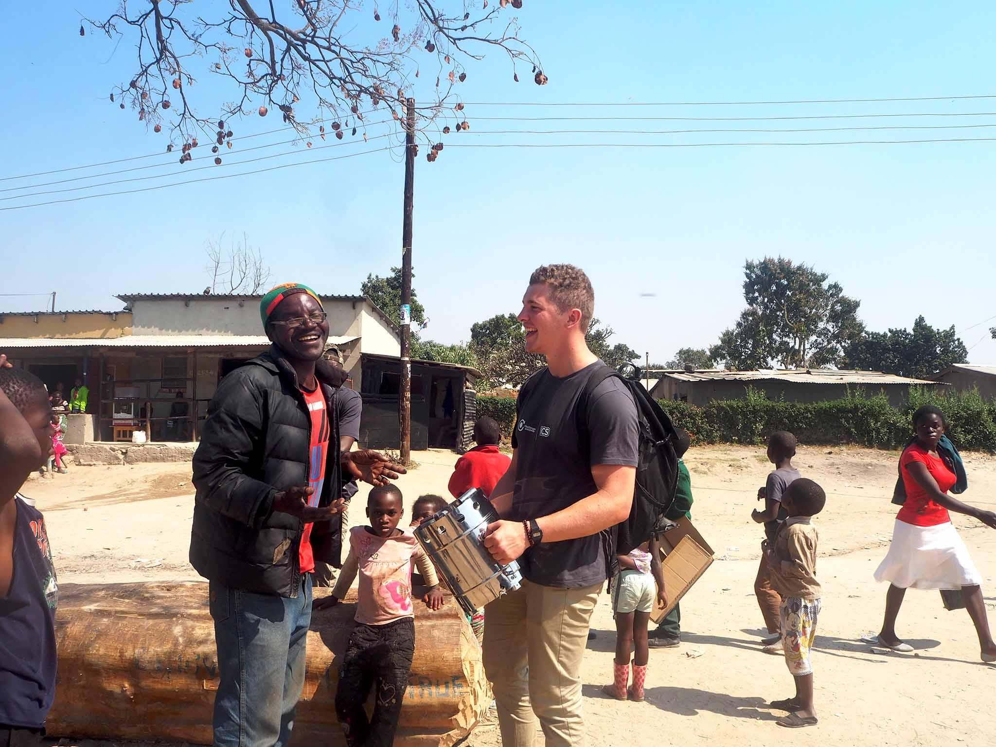 The steady income comes through first selling a wood stove and then continuing to provide wood chips in local church and women's groups