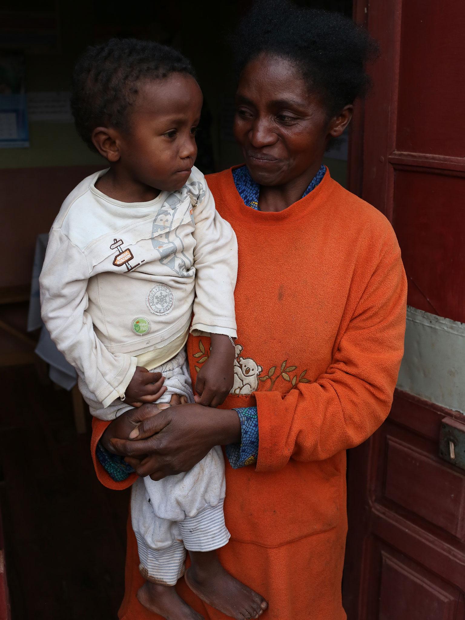 Sitraka with his mother, Mariette. She earns around 30 pence a day, and has trouble giving her son a full and balanced diet