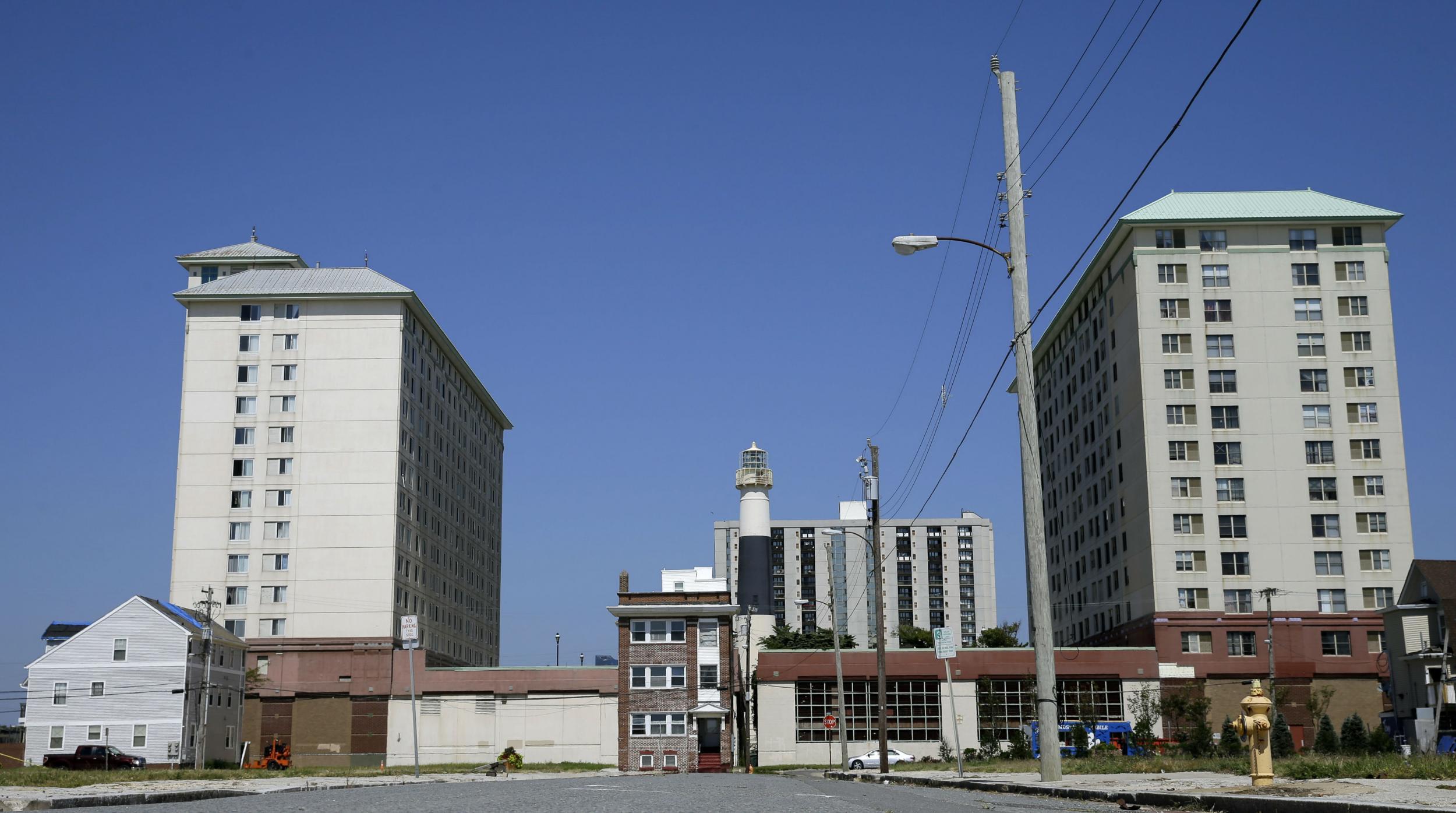 The little house that could. Mr Birnbaum's small brick house flanked by towers