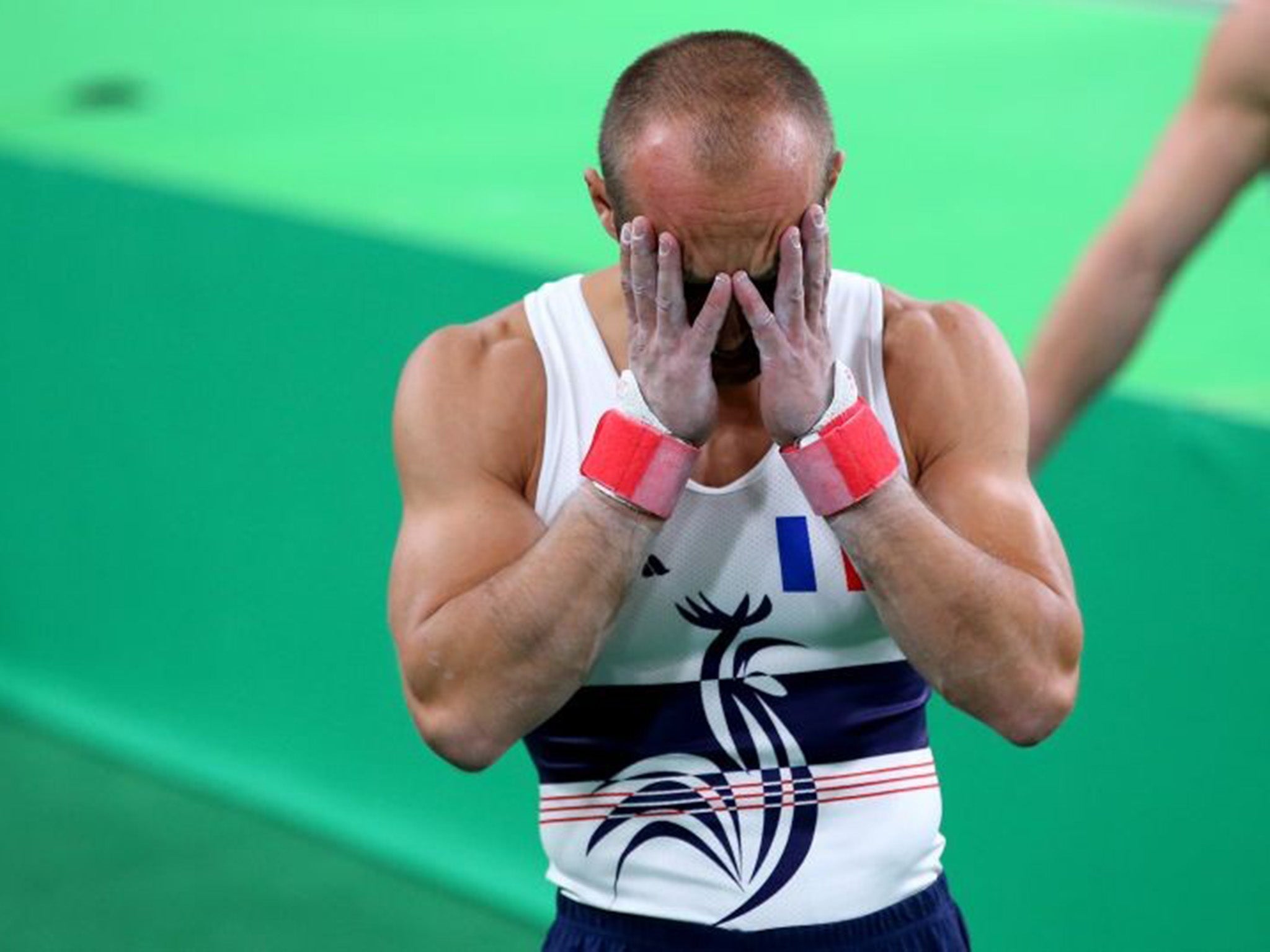 Mr Ait Said's teammate Danny Pinheiro Rodrigues with his head in his hands after seeing the break