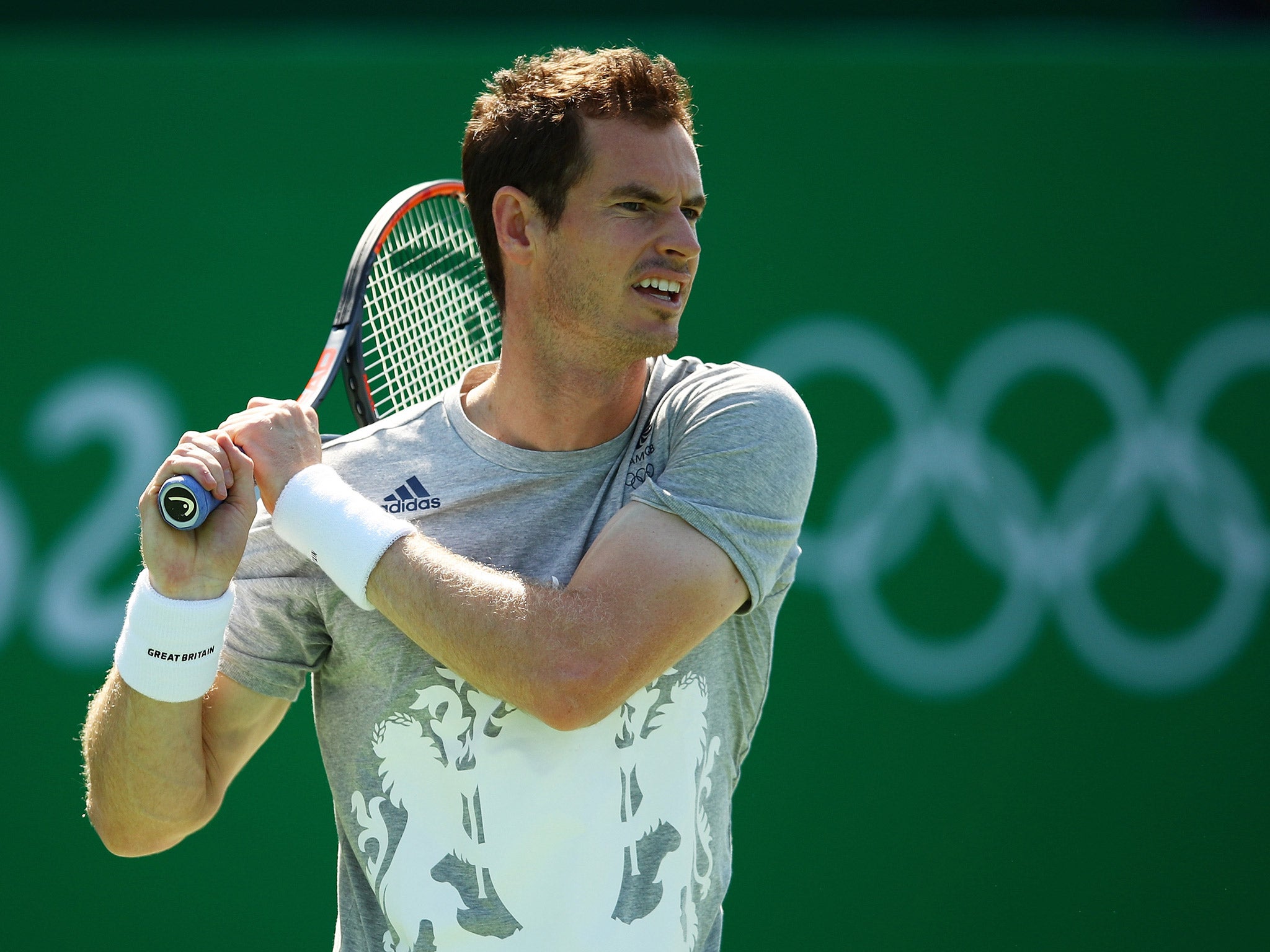 Andy Murray begins his Olympic Games gold medal defence against Viktor Troicki