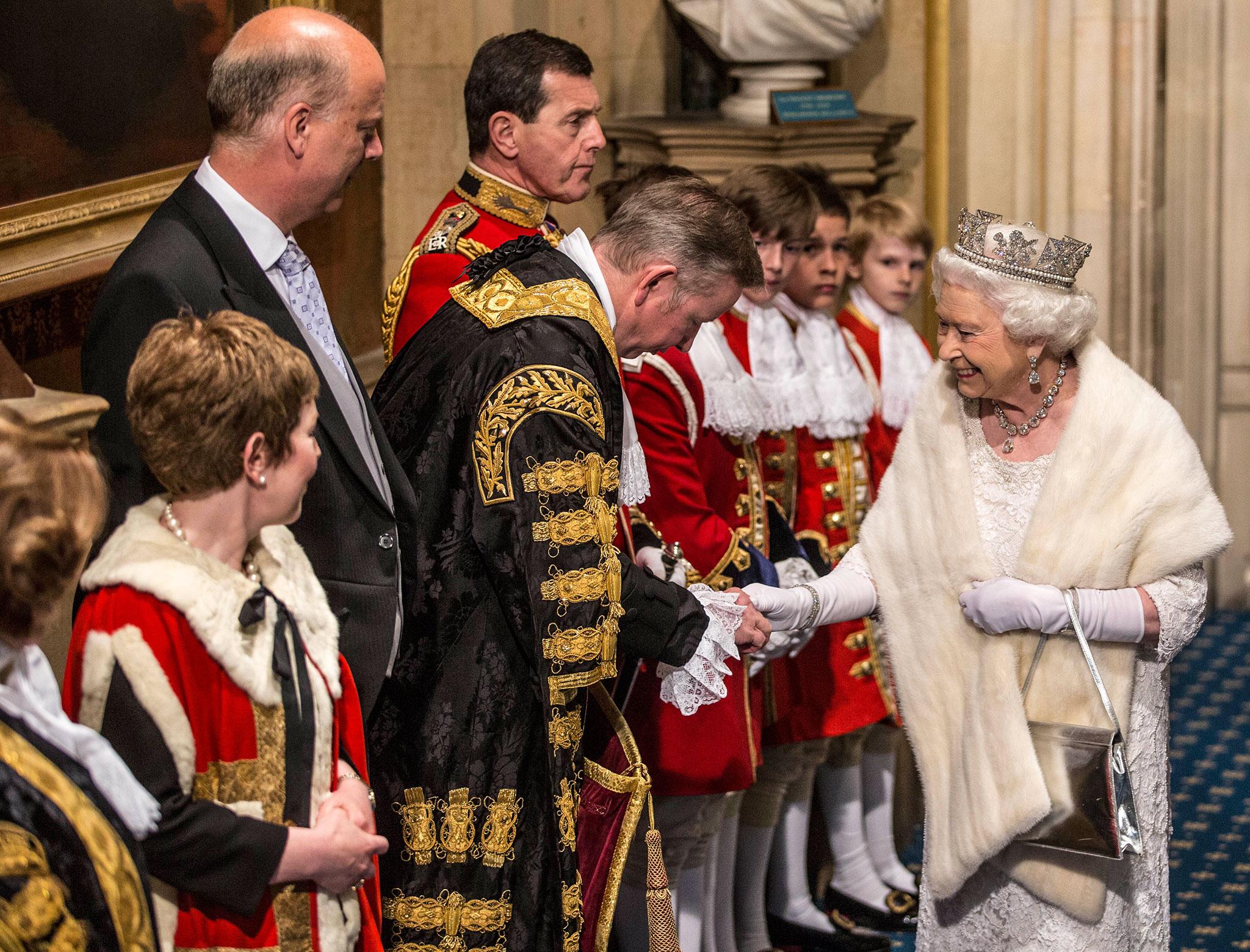 Queen Elizabeth speaks with Michael Gove at the state opening of Parliament in May 2015