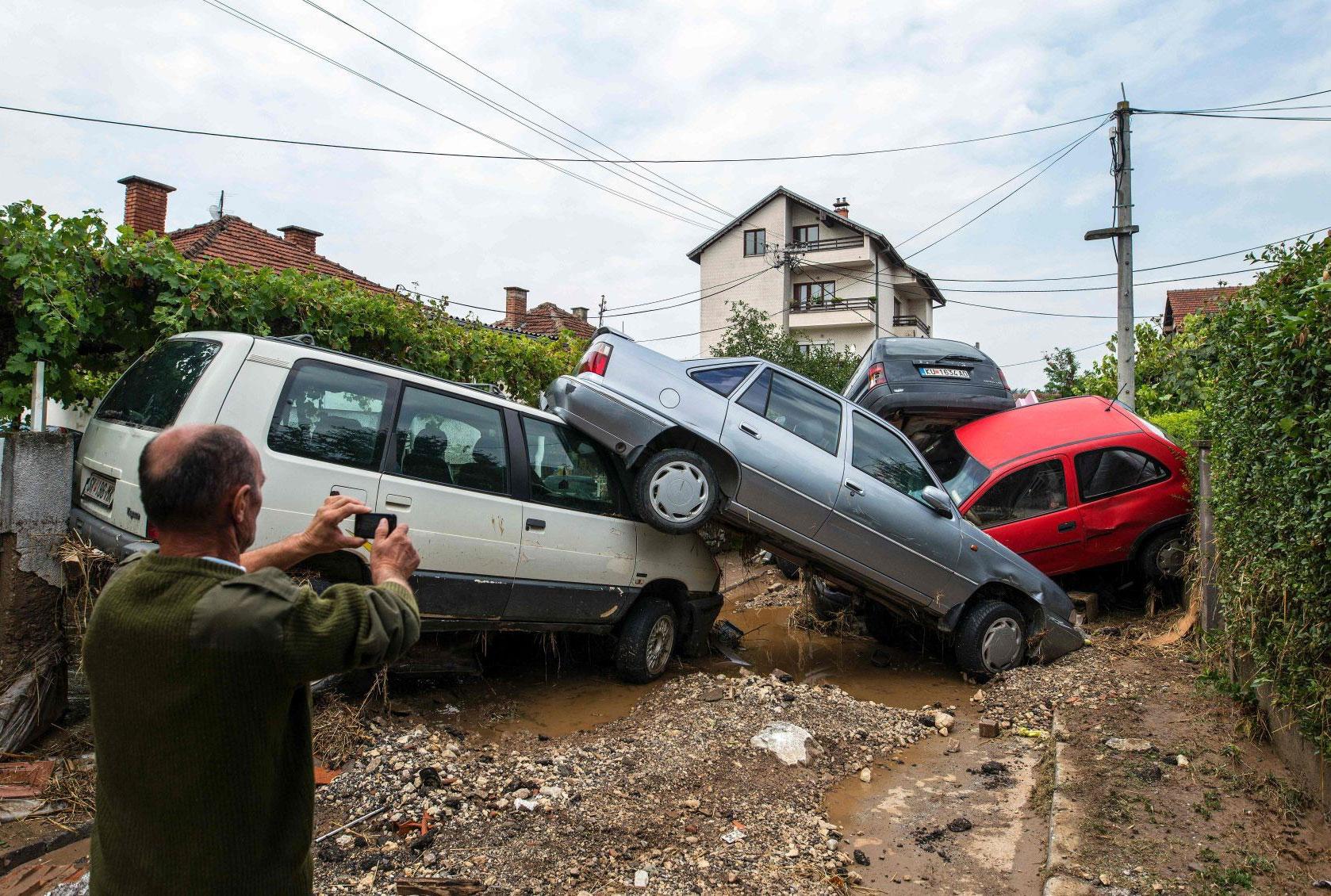 Fierce storms packing strong winds and torrential rains are feared to have killed dozens