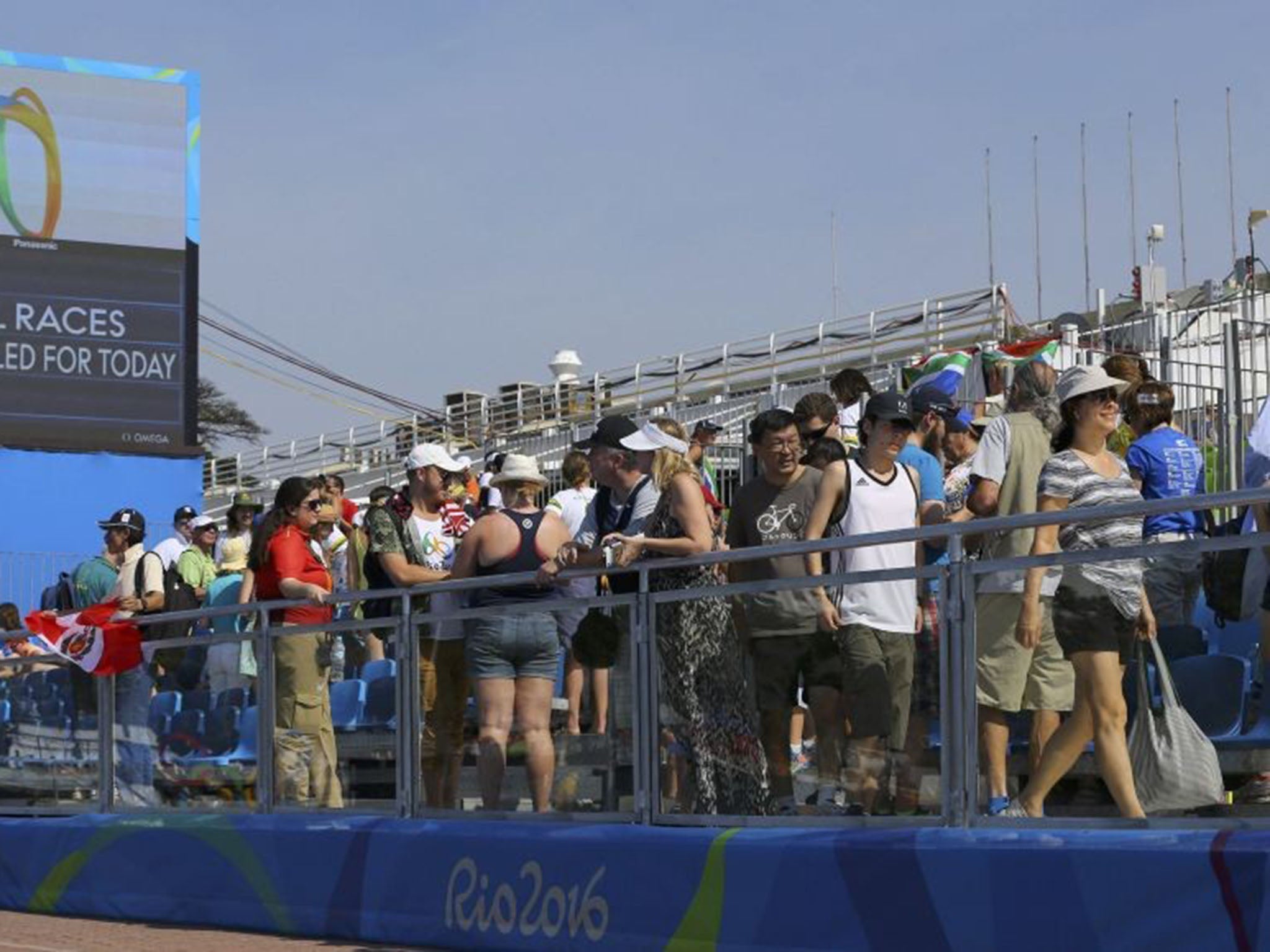 Fans at the Lagoa Stadium on Sunday after events were canceled. They were unable to quench their thirst at the stadium's bars on Saturday