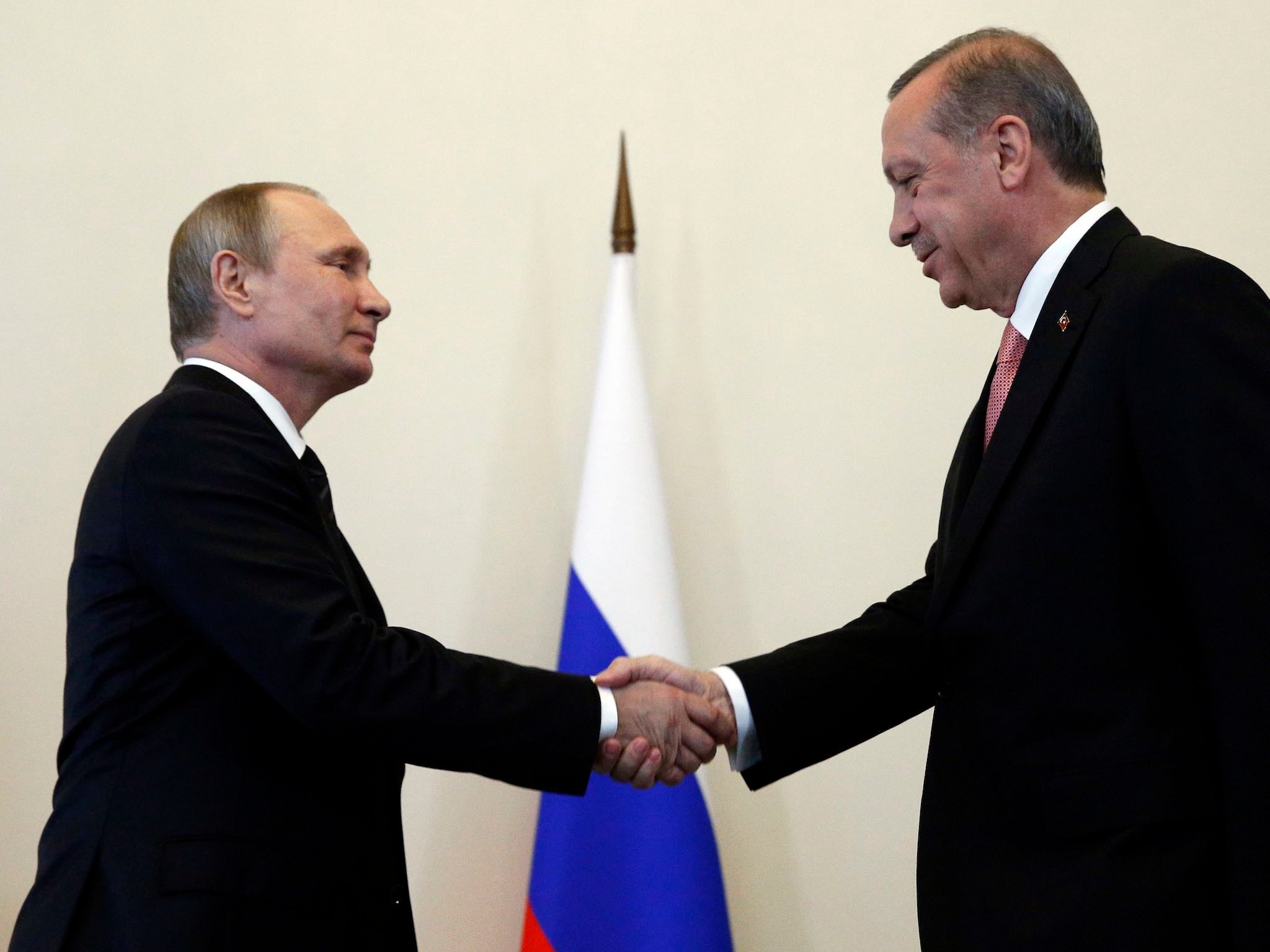 Mr Putin, left, met Mr Erdogan in the Konstantin palace outside St Petersburg