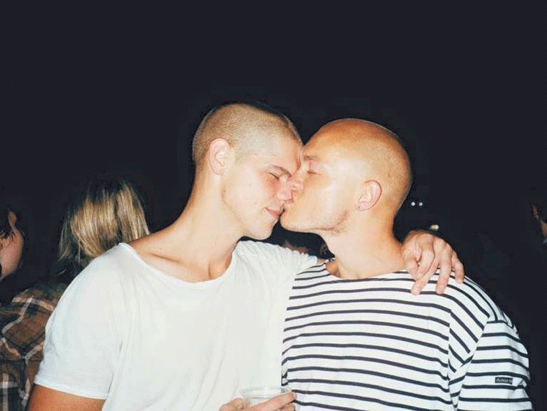 Samuel with his partner of three years, Bradley Tennant