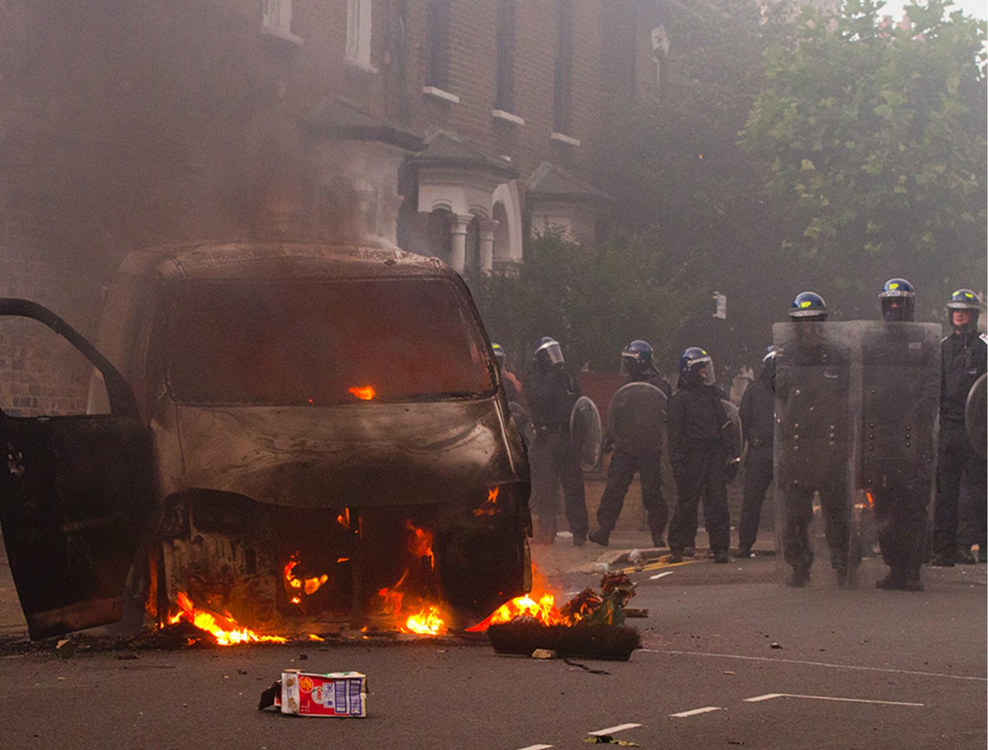 Riot police in Goulton Road, Hackney, east London five years ago