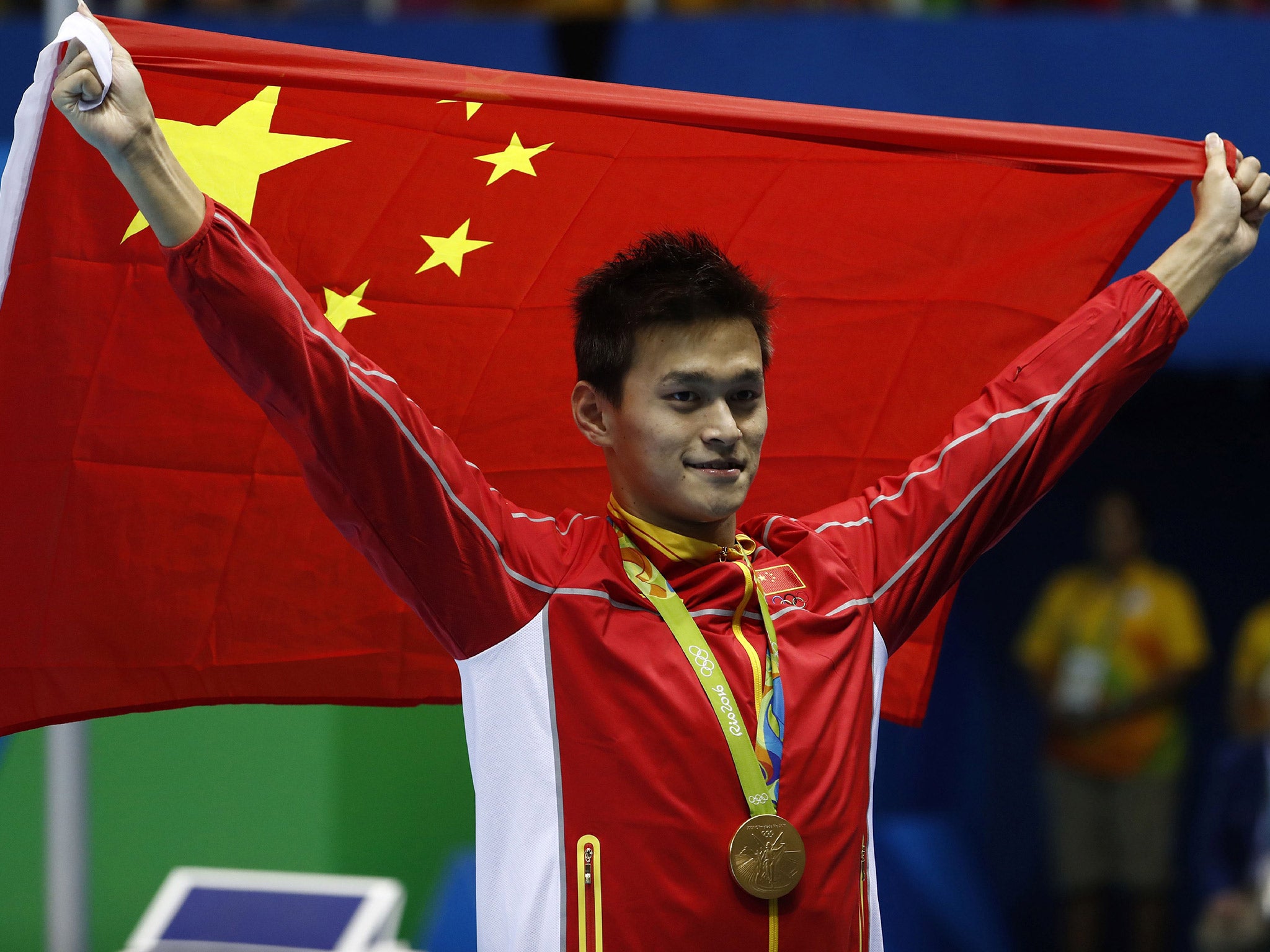 Sun Yang celebrates winning gold in the men's 200m freestyle final