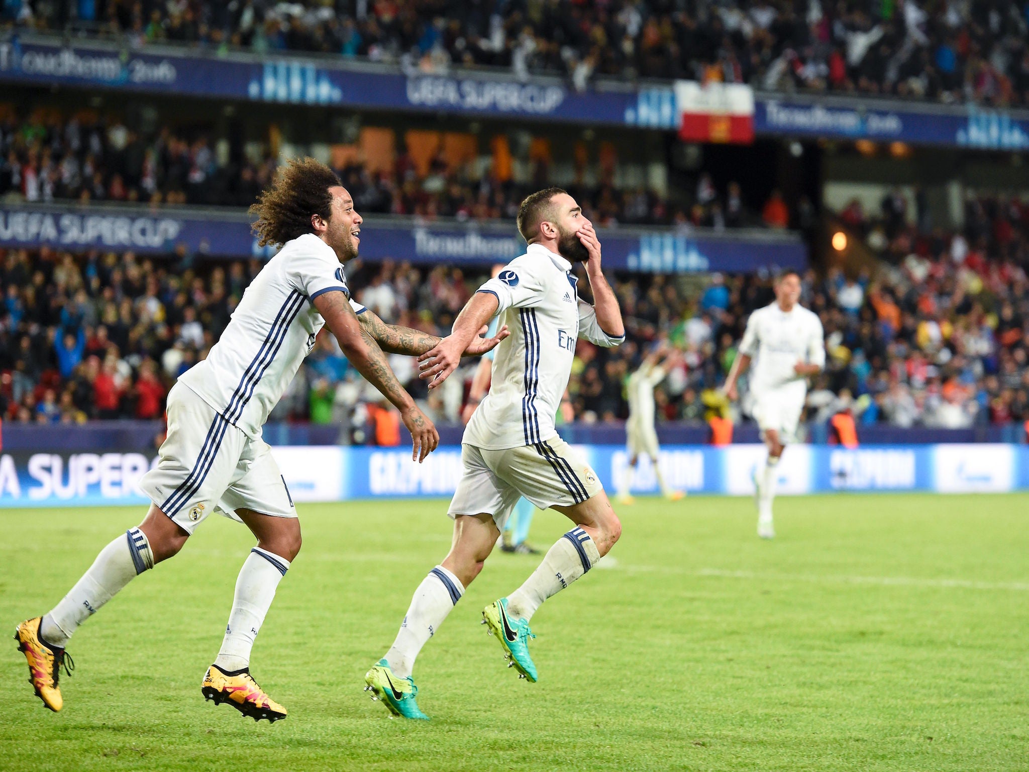 Dani Carvajal wheels away after scoring a late winner for Madrid