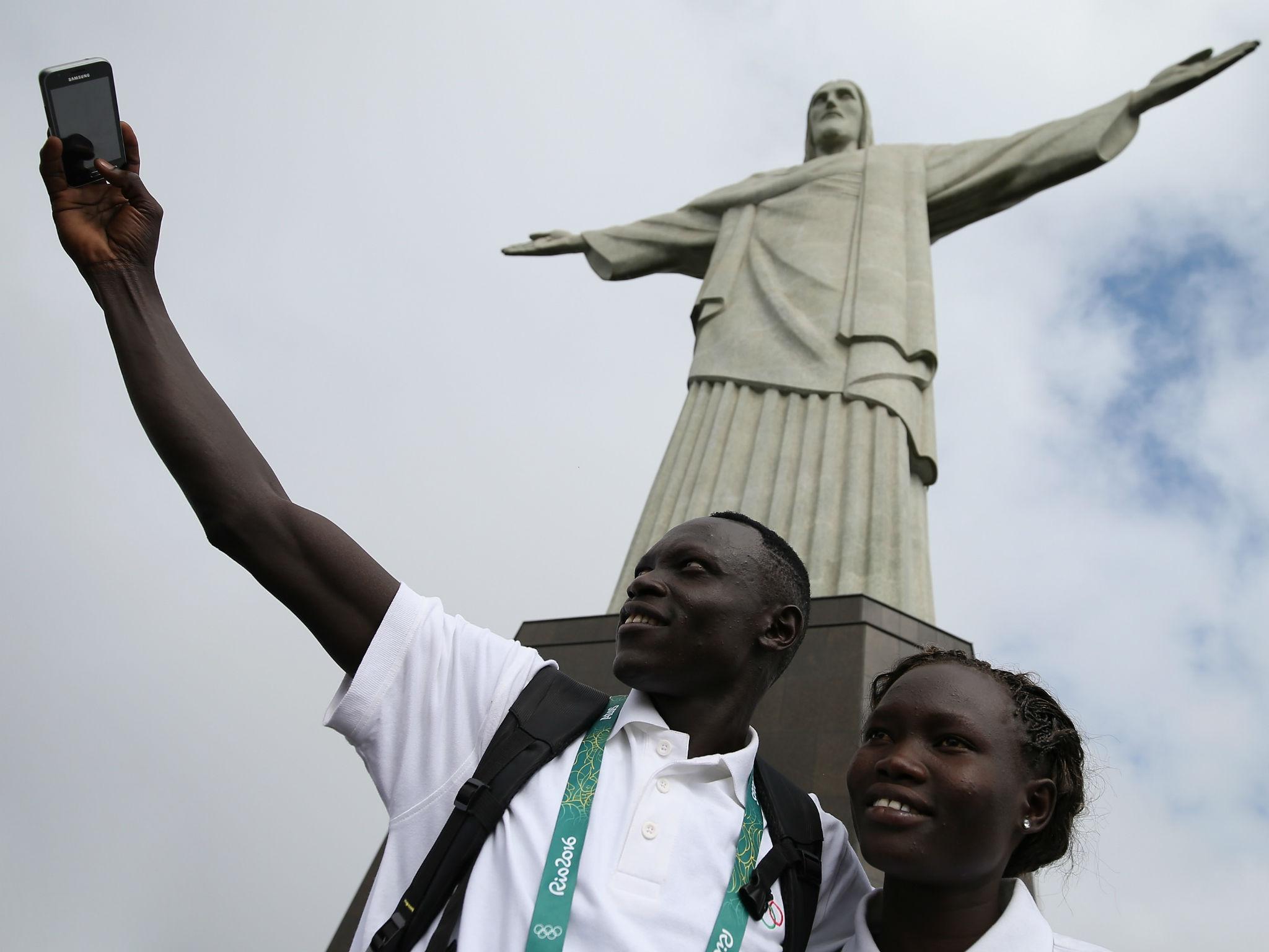 The refugee team visit Christ the Redeemer in Rio