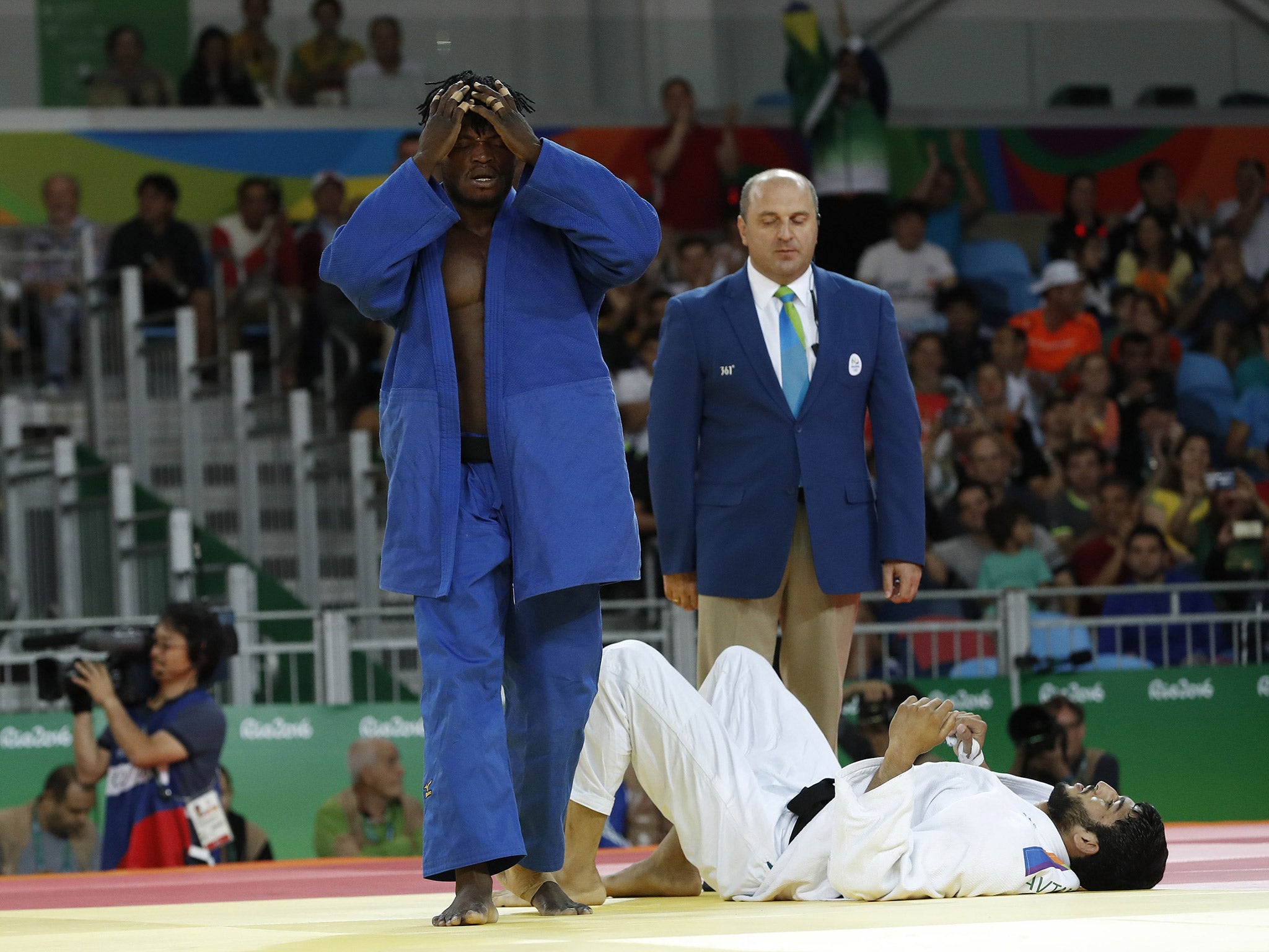 Popole Misenga reacts after beating Avtar Singh of India in the men's 90kg judo competition